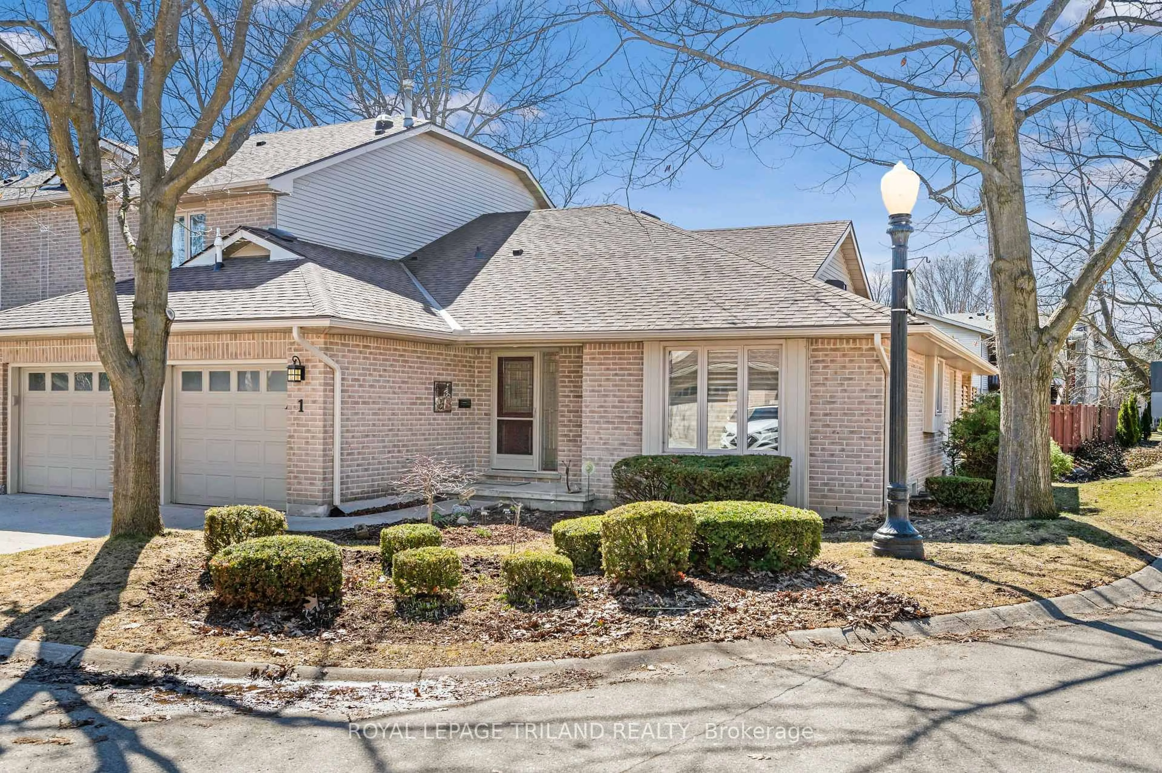 Home with brick exterior material, street for 70 Glenroy Rd #1, London South Ontario N5Z 4W9