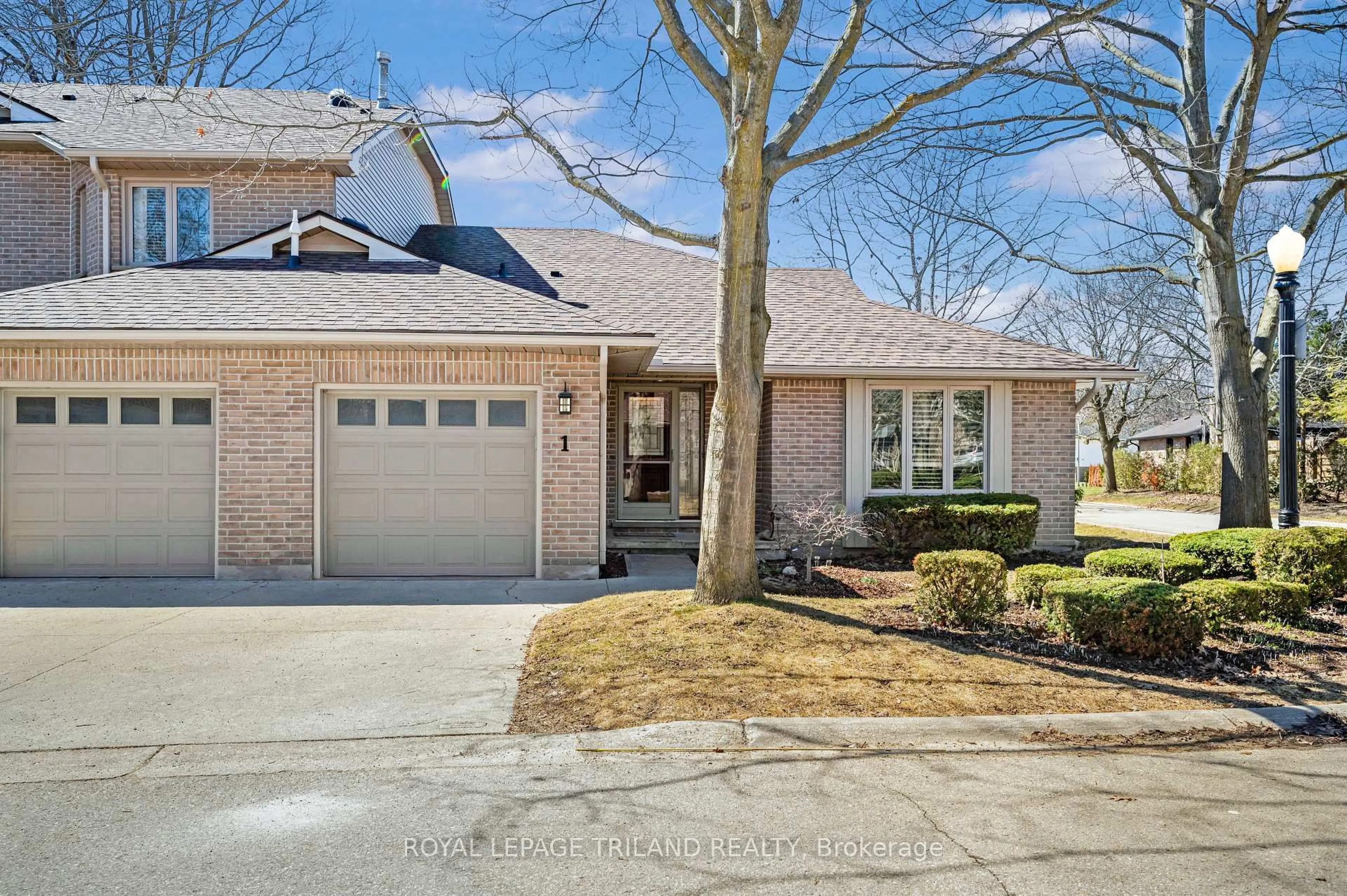 Home with brick exterior material, street for 70 Glenroy Rd #1, London South Ontario N5Z 4W9