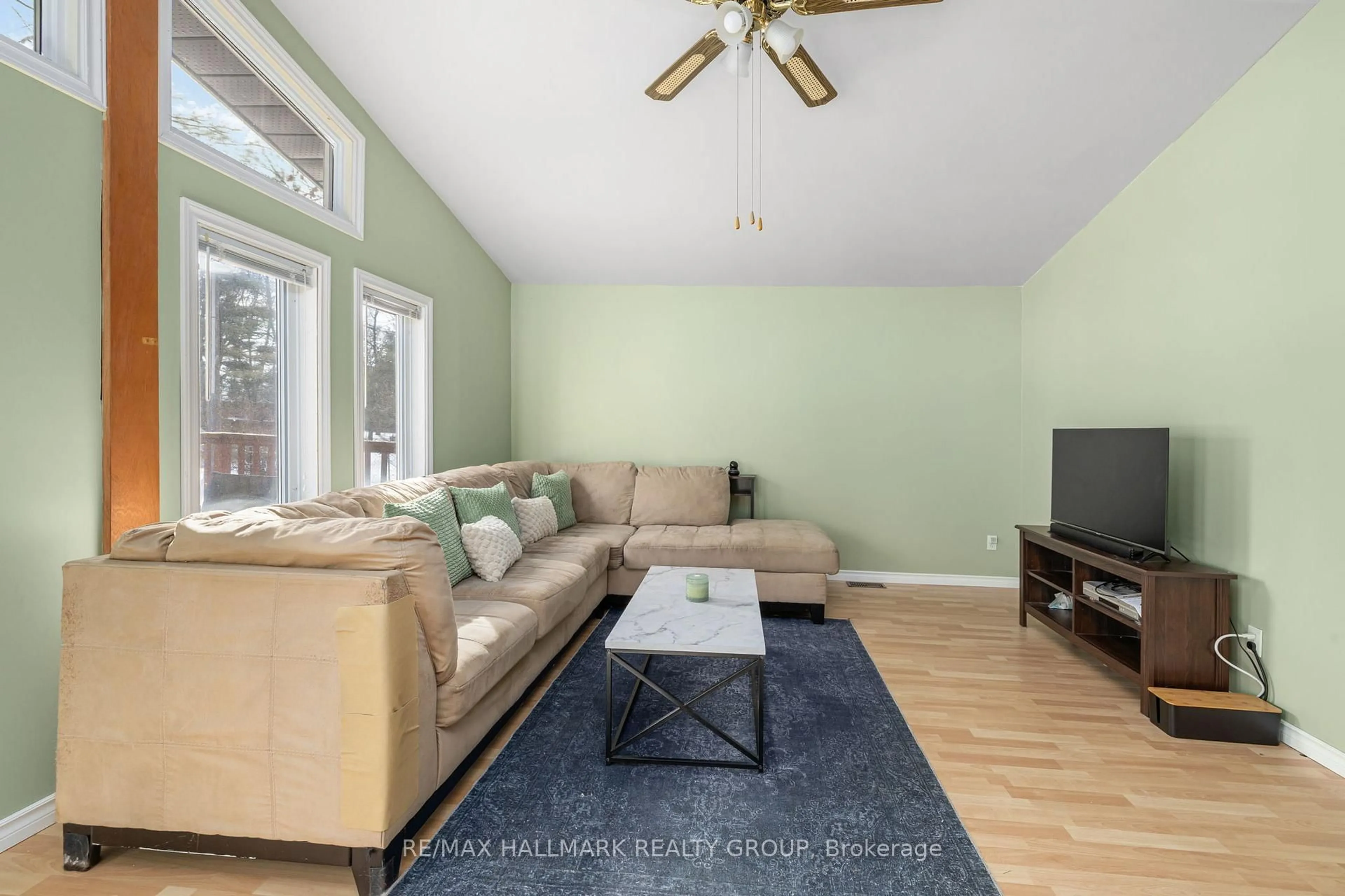 Living room with furniture, wood/laminate floor for 135 Woods Rd, Ottawa Ontario K0A 3M0