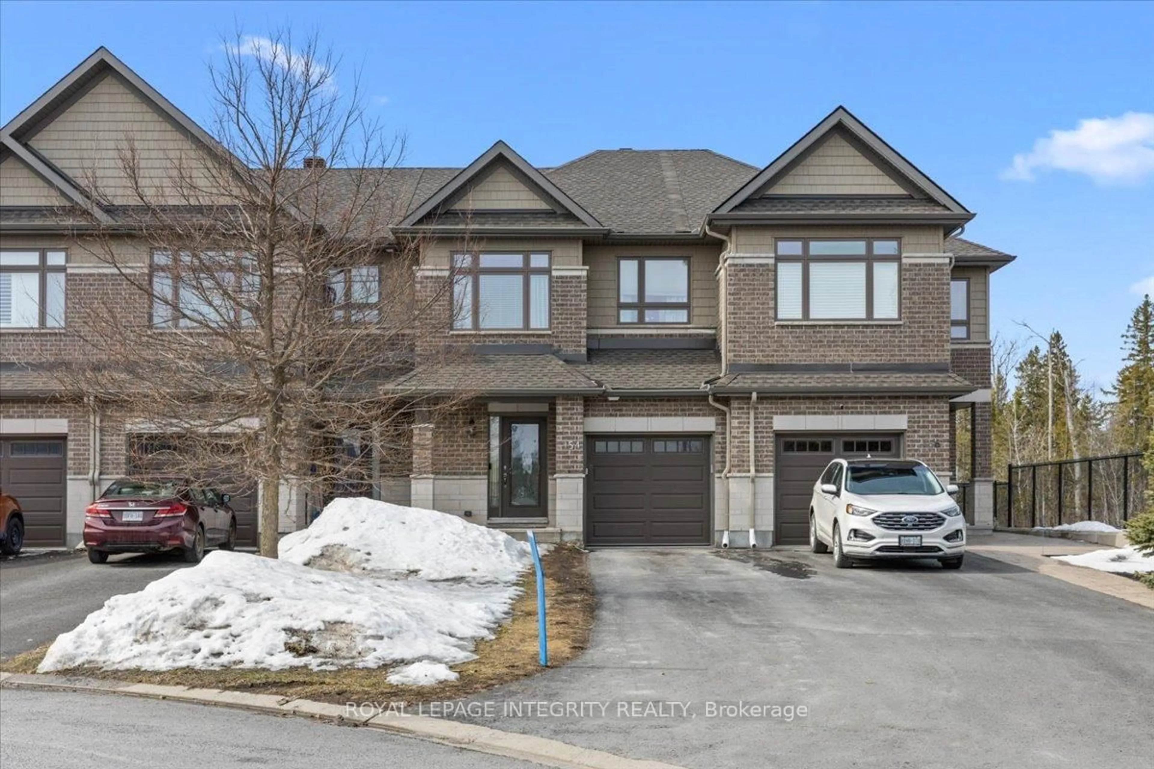 Home with brick exterior material, street for 154 Woodhurst Cres, Stittsville Ontario K2S 0T5