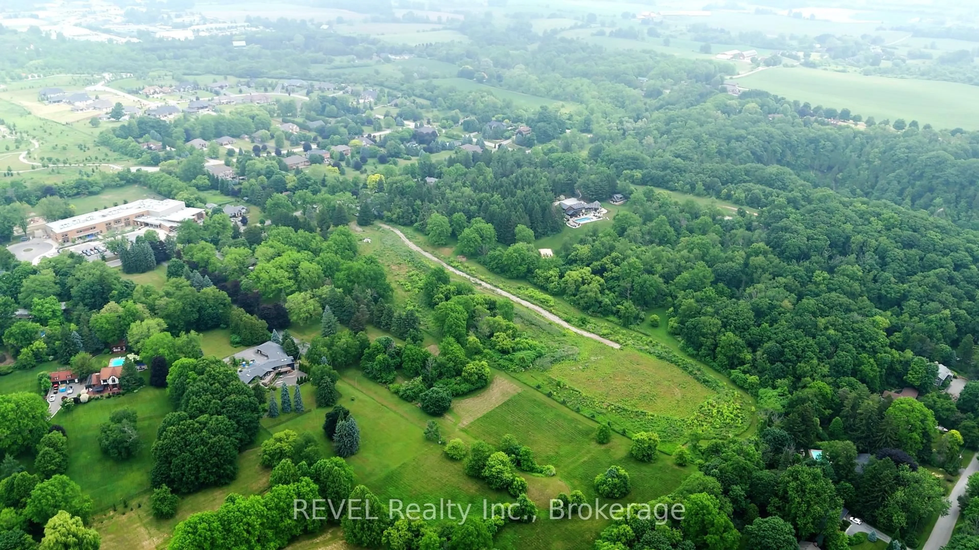 A pic from outside/outdoor area/front of a property/back of a property/a pic from drone, unknown for 610-612-614 Harvest Rd, Hamilton Ontario L9H 5K7