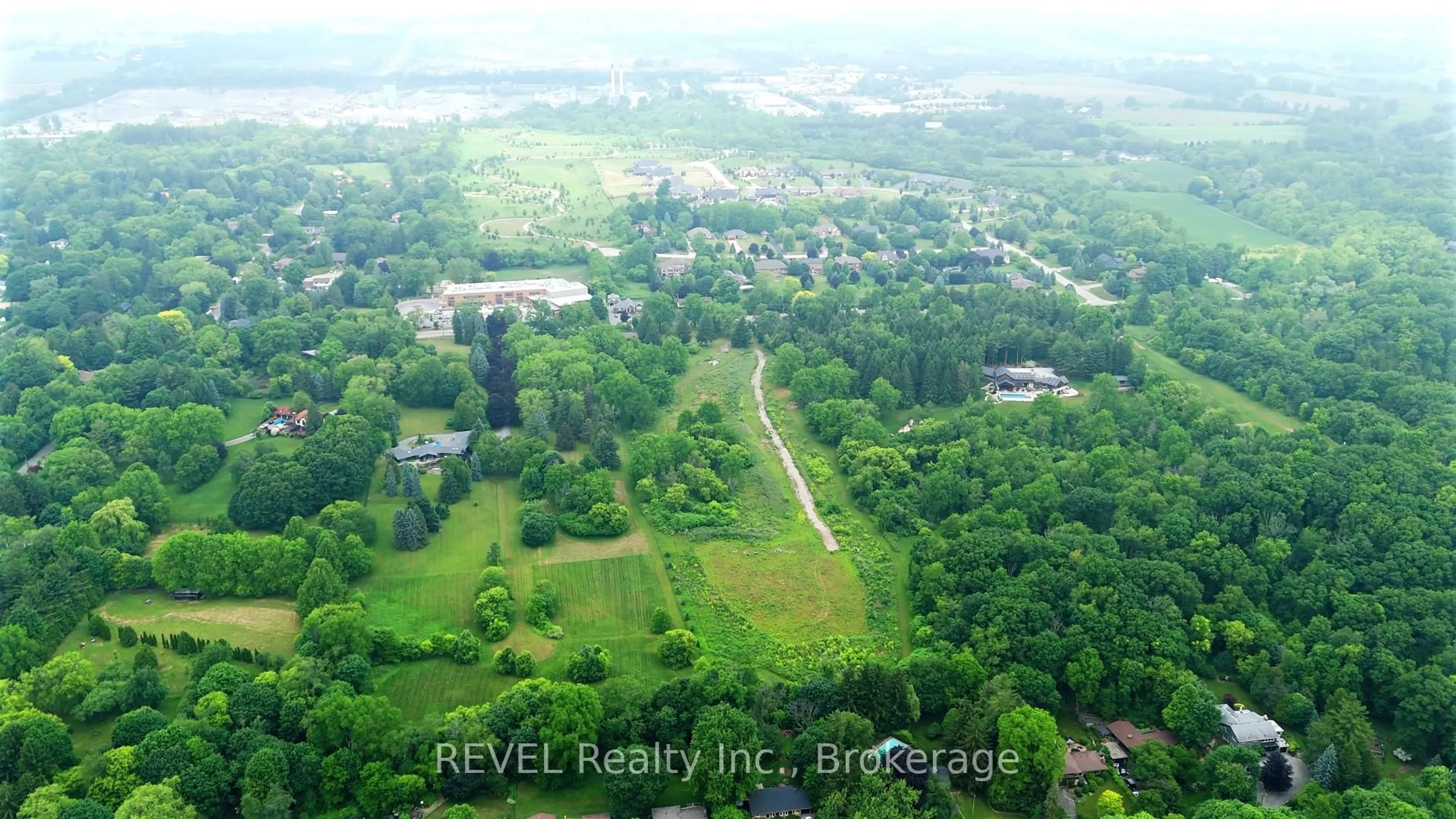 A pic from outside/outdoor area/front of a property/back of a property/a pic from drone, water/lake/river/ocean view for 610-612-614 Harvest Rd, Hamilton Ontario L9H 5K7