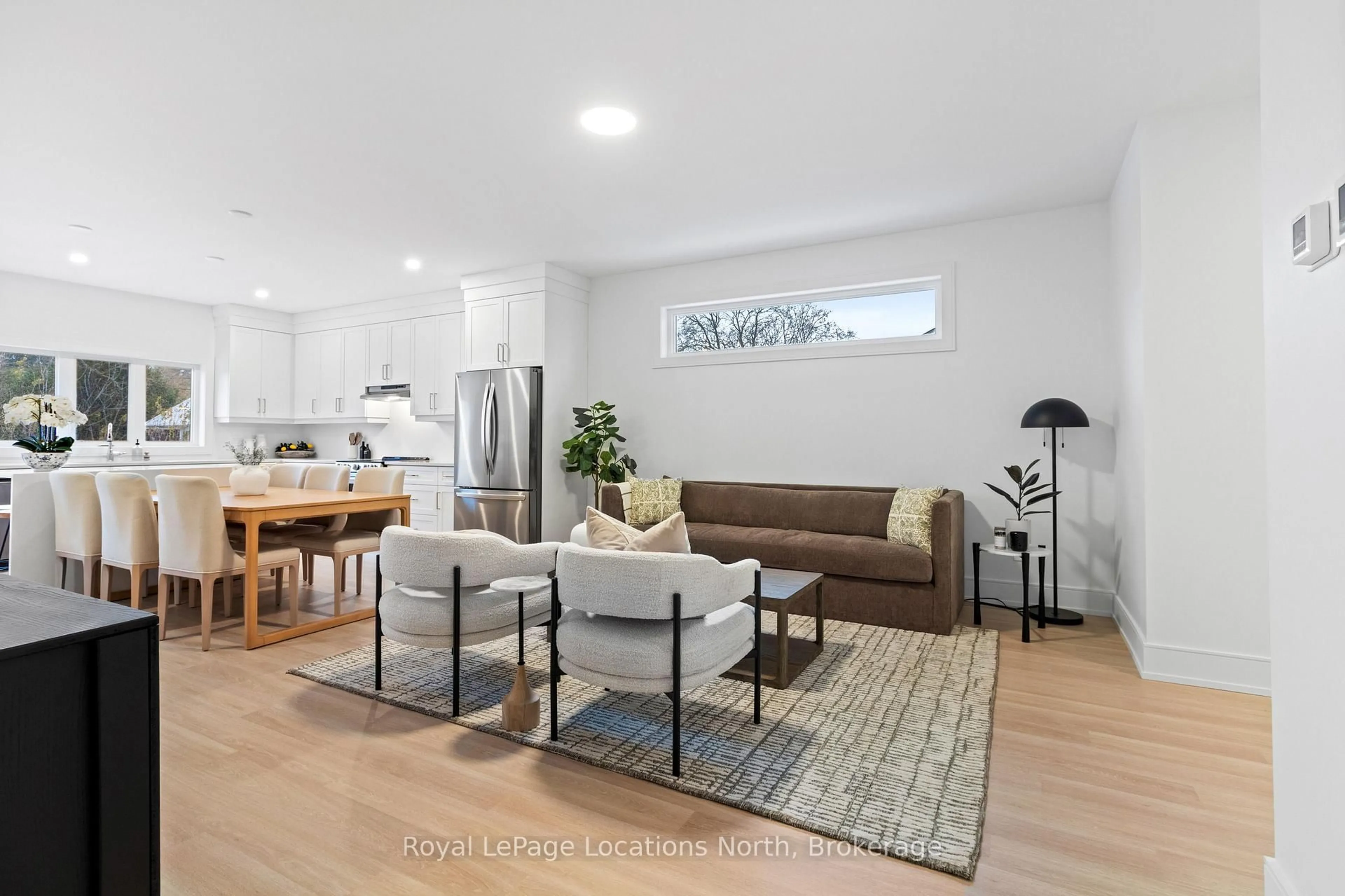 Living room with furniture, wood/laminate floor for 126 EMERSON Way, West Grey Ontario N0G 1R0