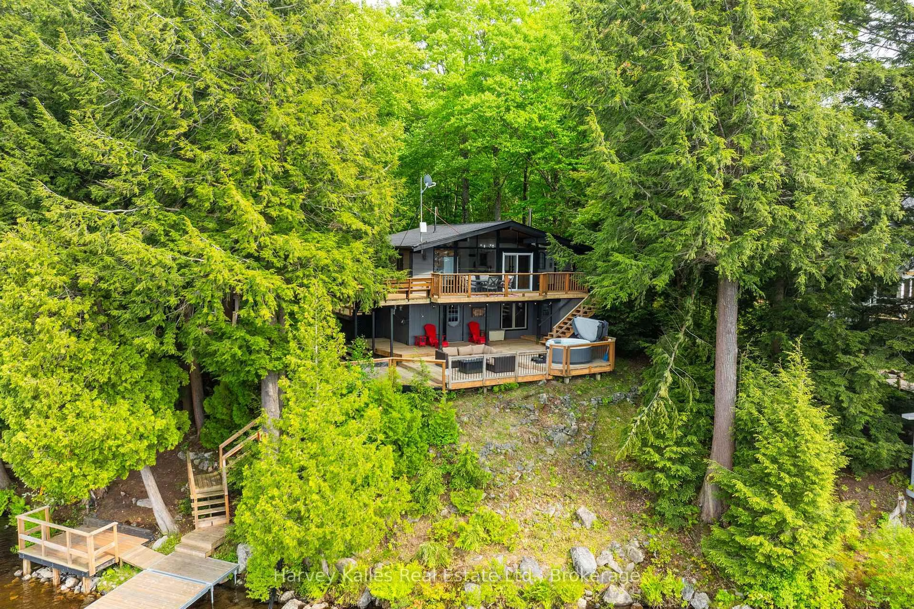 A pic from outside/outdoor area/front of a property/back of a property/a pic from drone, forest/trees view for 1648 Acton Island Rd, Muskoka Lakes Ontario P0C 1A0