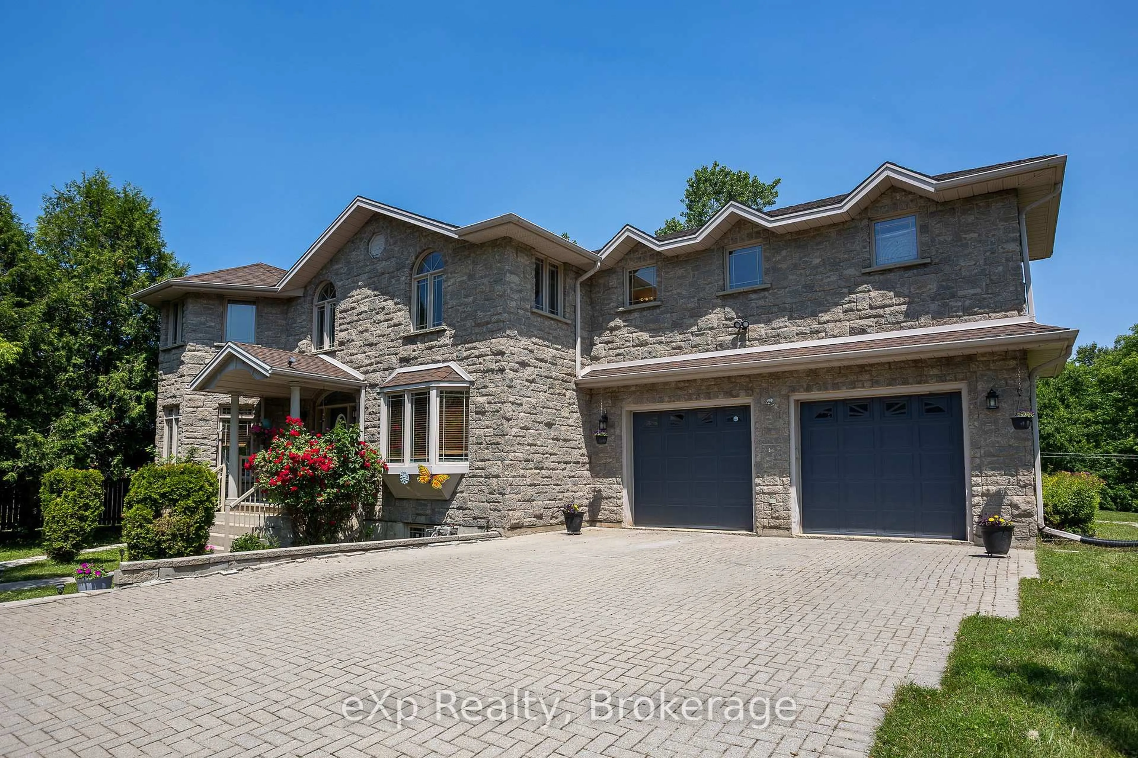 Home with brick exterior material, street for 910 26th St, Owen Sound Ontario N4K 5N3