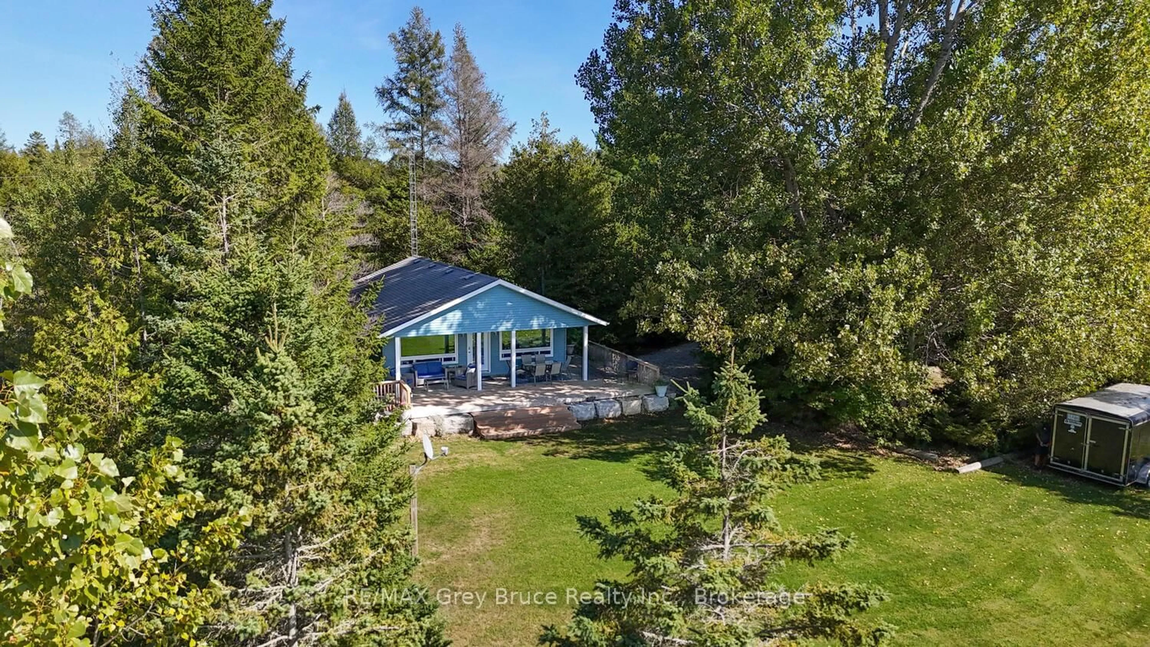 A pic from outside/outdoor area/front of a property/back of a property/a pic from drone, forest/trees view for 1208 Sunset Dr, South Bruce Peninsula Ontario N0H 2T0