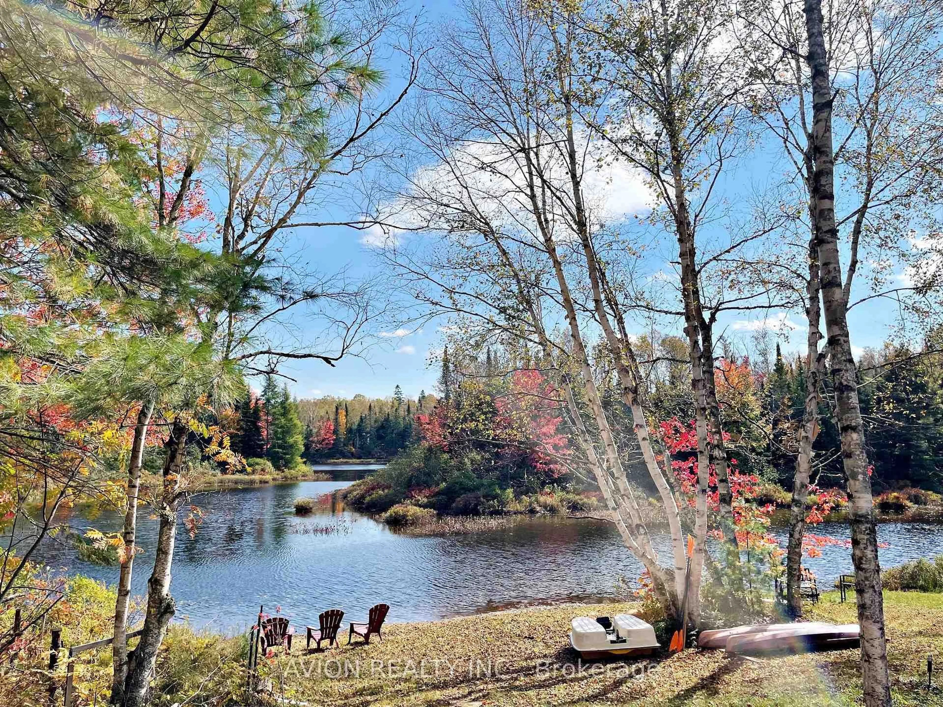 A pic from outside/outdoor area/front of a property/back of a property/a pic from drone, water/lake/river/ocean view for 185 Fisher Lake Lane, Kearney Ontario P0A 1M0
