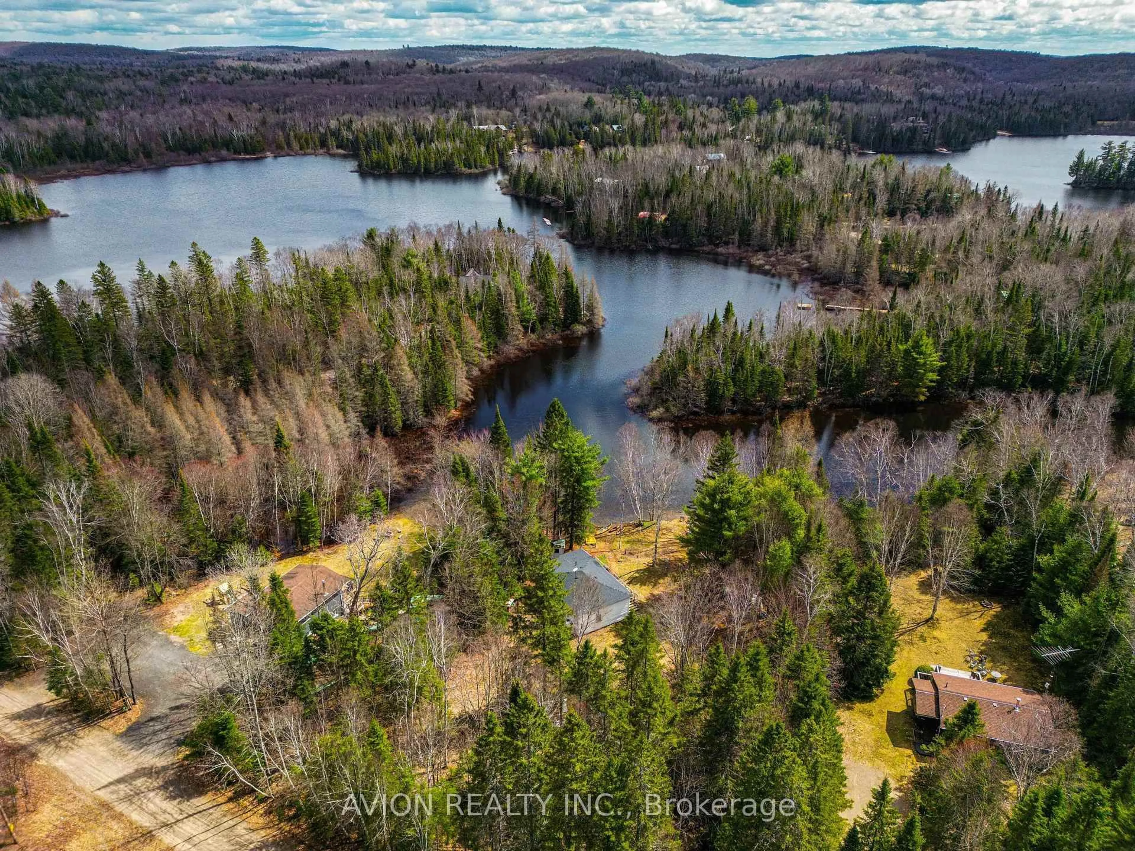 A pic from outside/outdoor area/front of a property/back of a property/a pic from drone, water/lake/river/ocean view for 185 Fisher Lake Lane, Kearney Ontario P0A 1M0