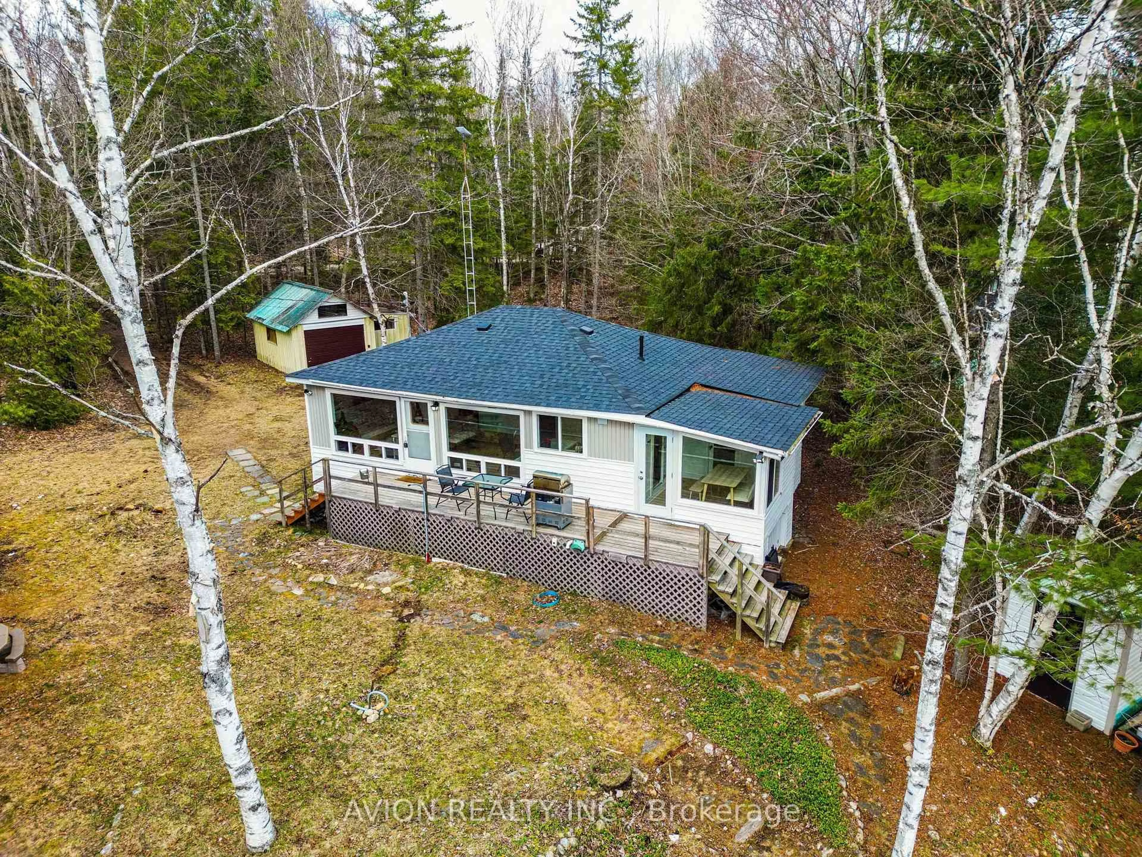 A pic from outside/outdoor area/front of a property/back of a property/a pic from drone, unknown for 185 Fisher Lake Lane, Kearney Ontario P0A 1M0