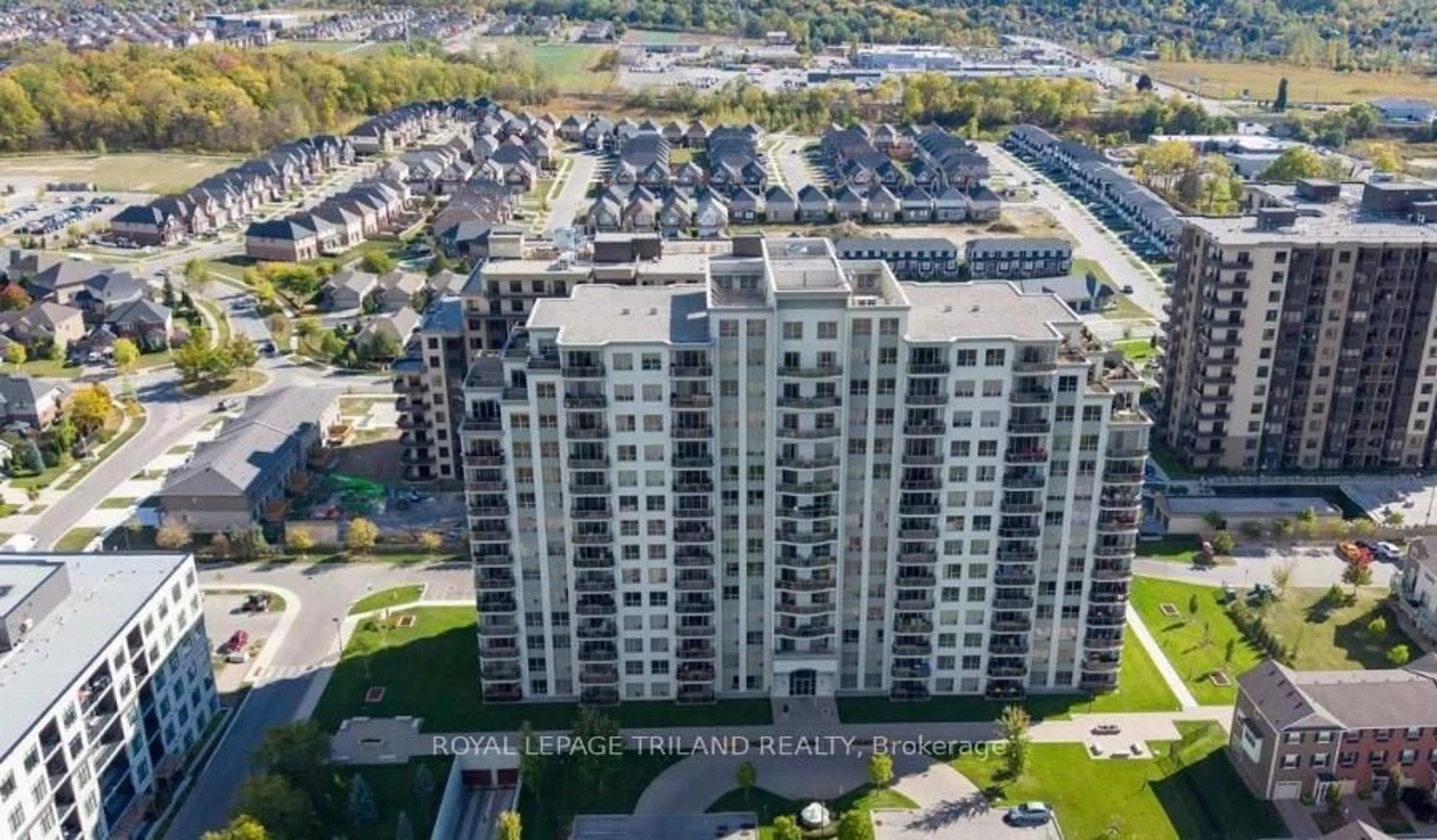 A pic from outside/outdoor area/front of a property/back of a property/a pic from drone, unknown for 1030 Coronation Dr #406, London North Ontario N6G 0G5