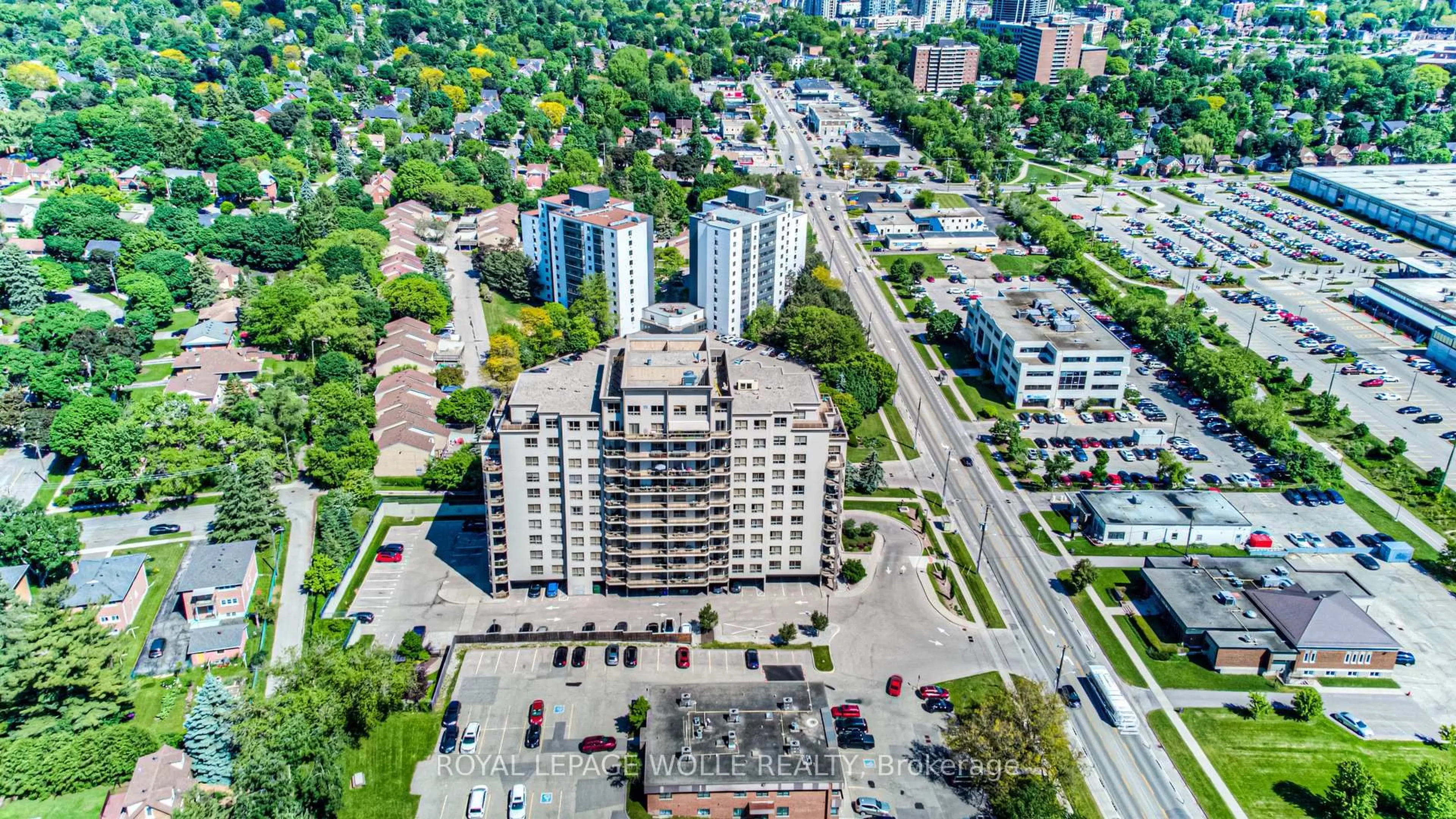 A pic from outside/outdoor area/front of a property/back of a property/a pic from drone, city buildings view from balcony for 539 Belmont Ave #407, Kitchener Ontario N2M 0A2