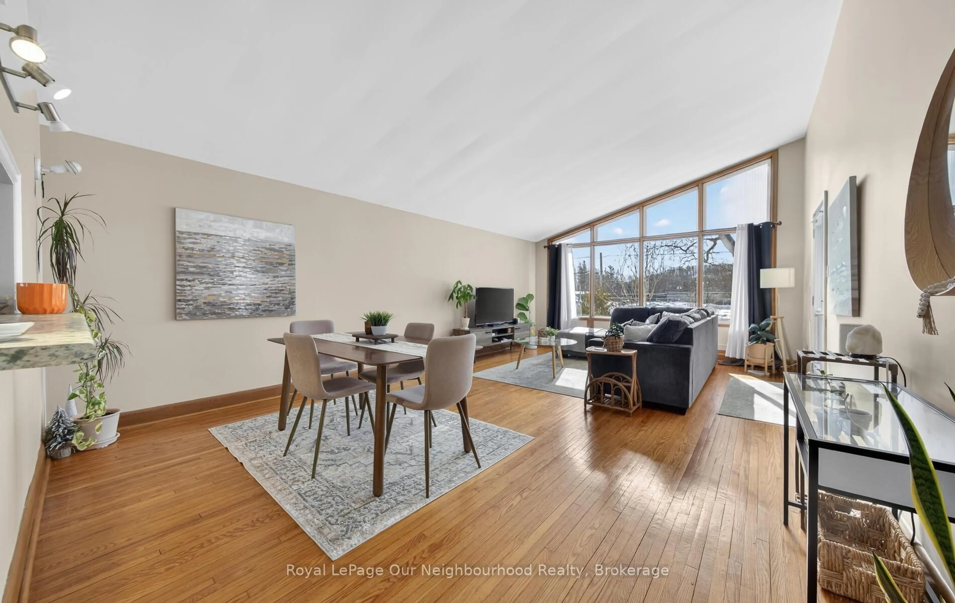 Living room with furniture, wood/laminate floor for 66 sidney Cres, Quinte West Ontario K0K 1E0