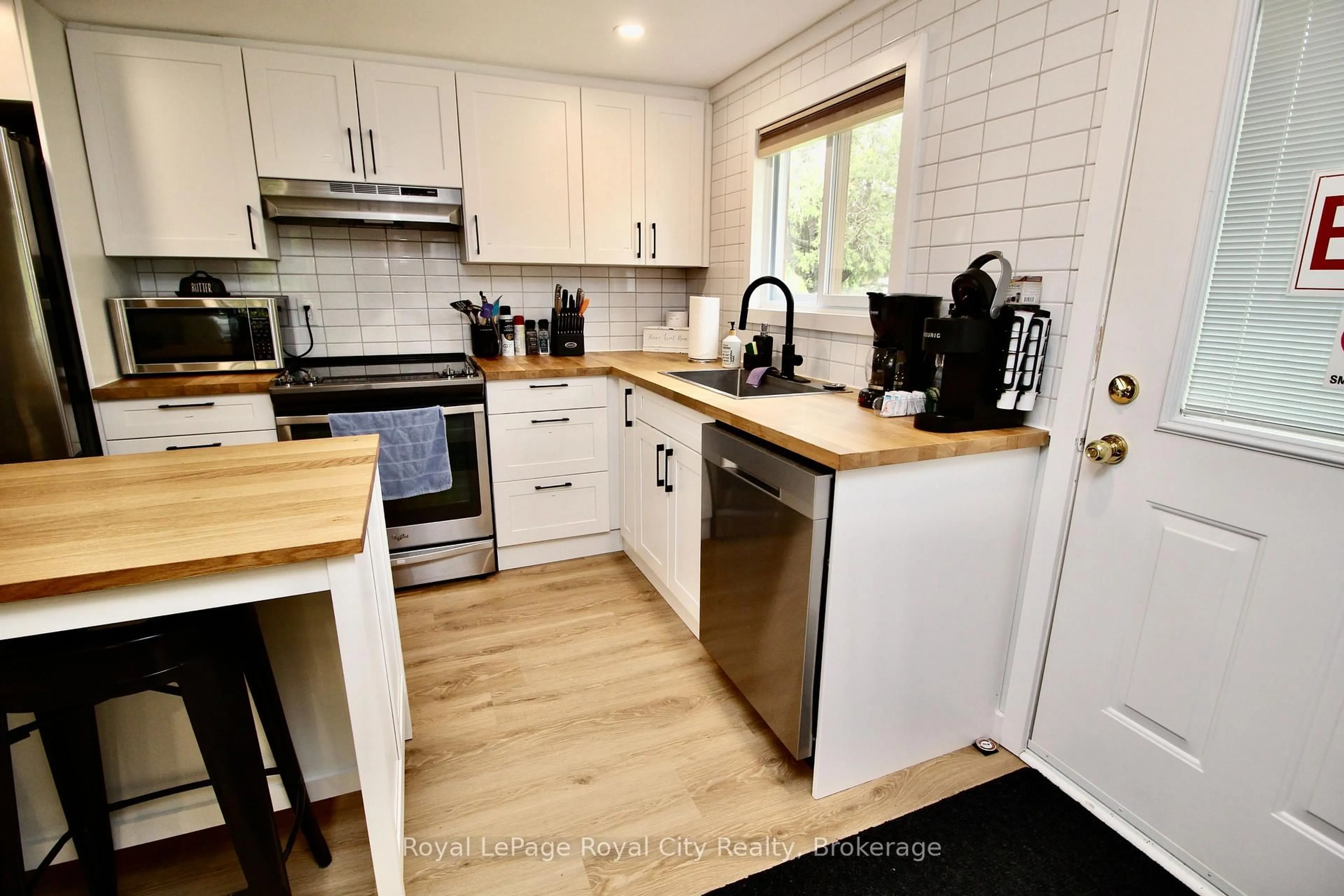 Open concept kitchen, wood/laminate floor for 6339 6 Highway, Northern Bruce Peninsula Ontario N0H 2R0