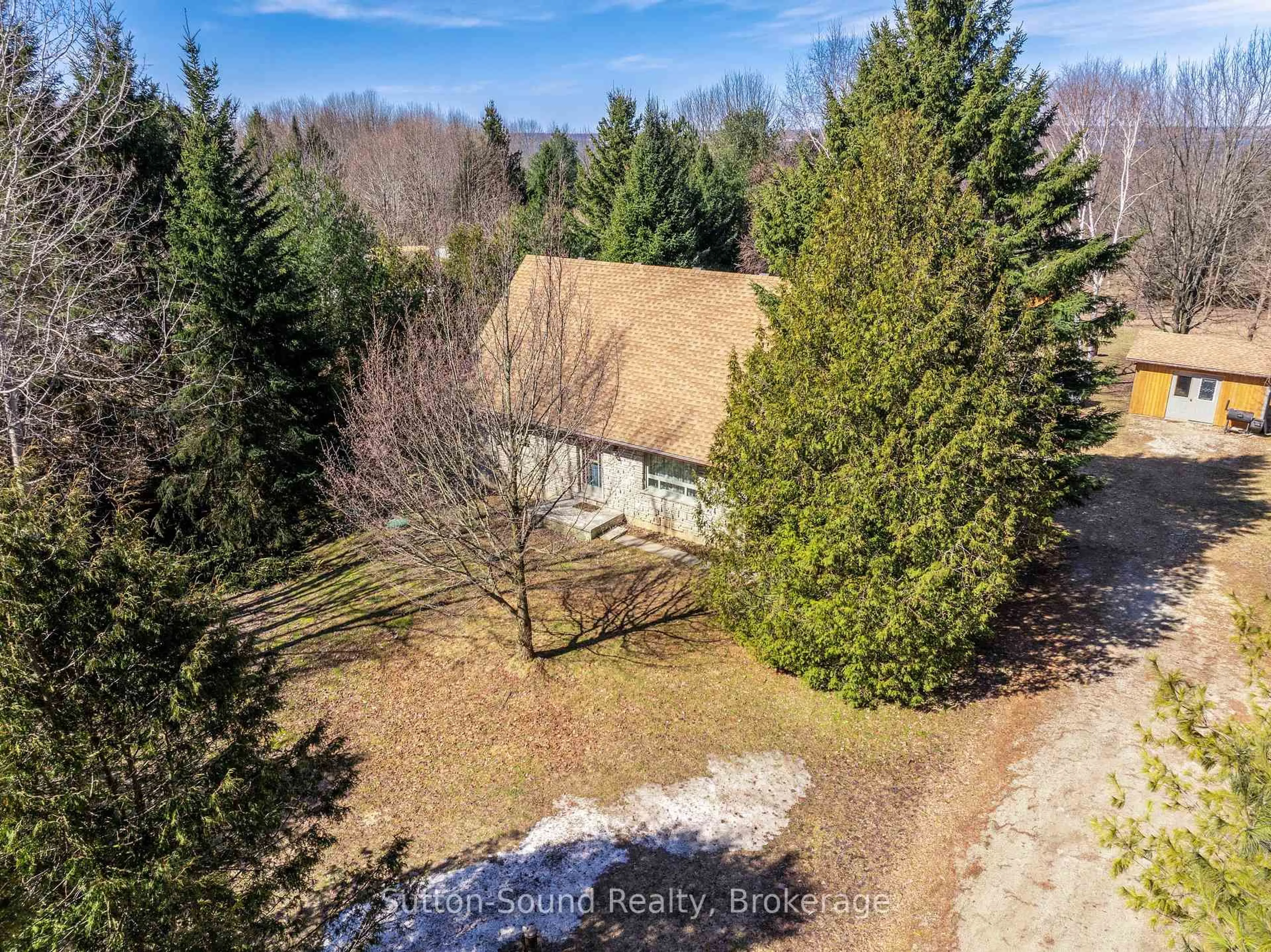A pic from outside/outdoor area/front of a property/back of a property/a pic from drone, forest/trees view for 350222 Bayshore Rd, Meaford Ontario N0H 1B0