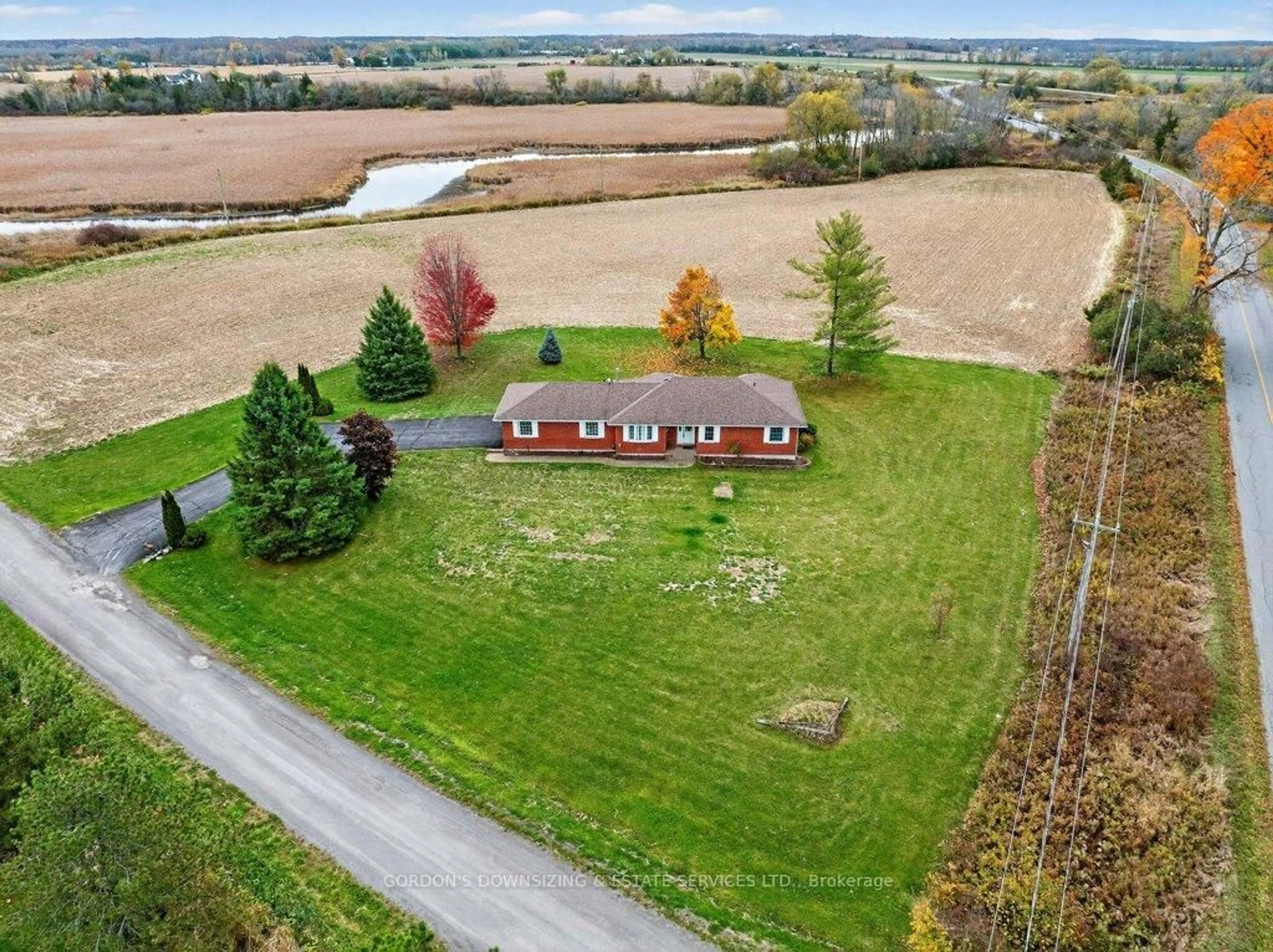 A pic from outside/outdoor area/front of a property/back of a property/a pic from drone, unknown for 18 Weatherhead Rd, Prince Edward County Ontario K8N 4Z7