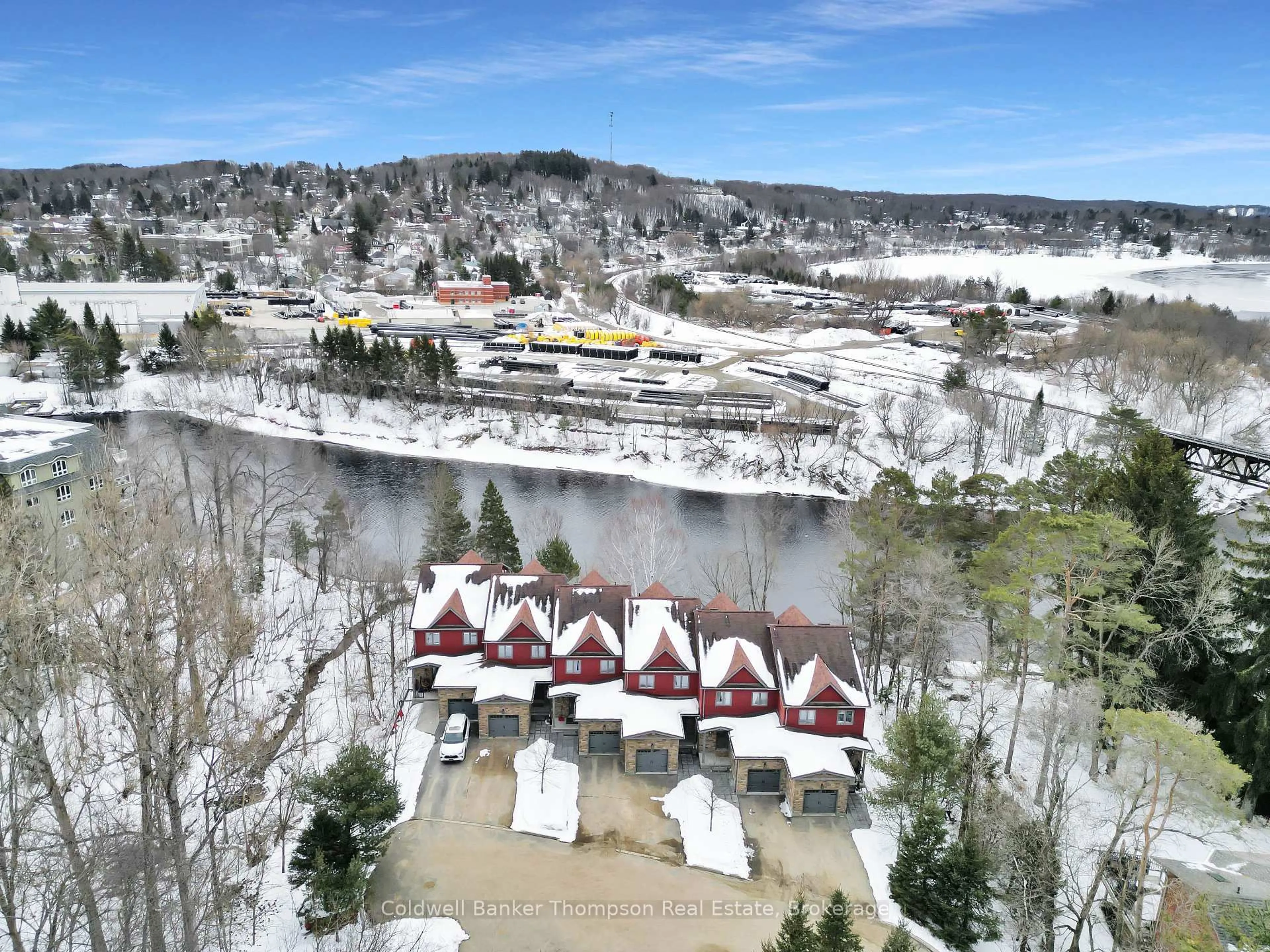 A pic from outside/outdoor area/front of a property/back of a property/a pic from drone, unknown for 23 Winona Dr #2, Huntsville Ontario P1H 1L9