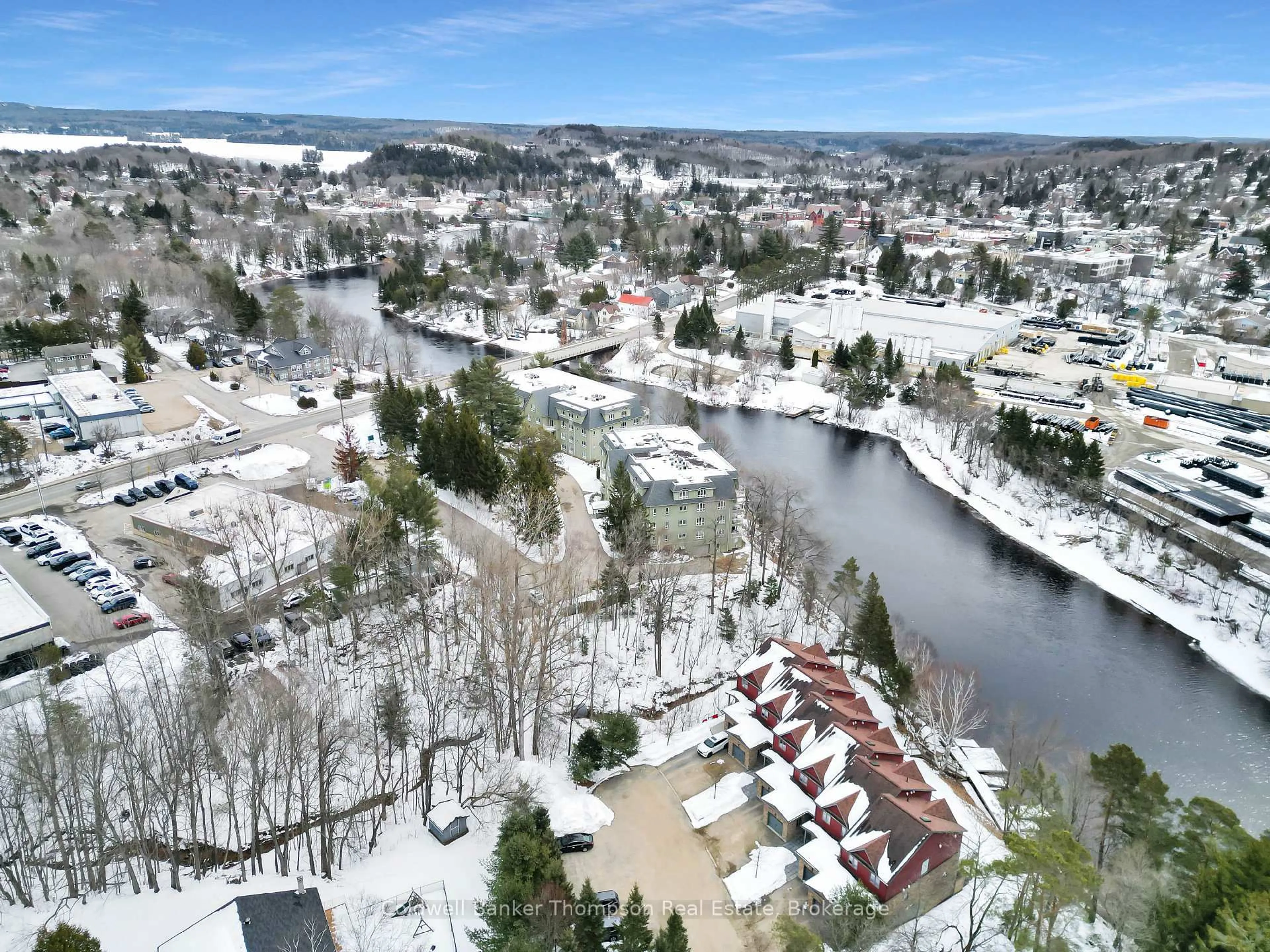 A pic from outside/outdoor area/front of a property/back of a property/a pic from drone, mountain view for 23 Winona Dr #2, Huntsville Ontario P1H 1L9