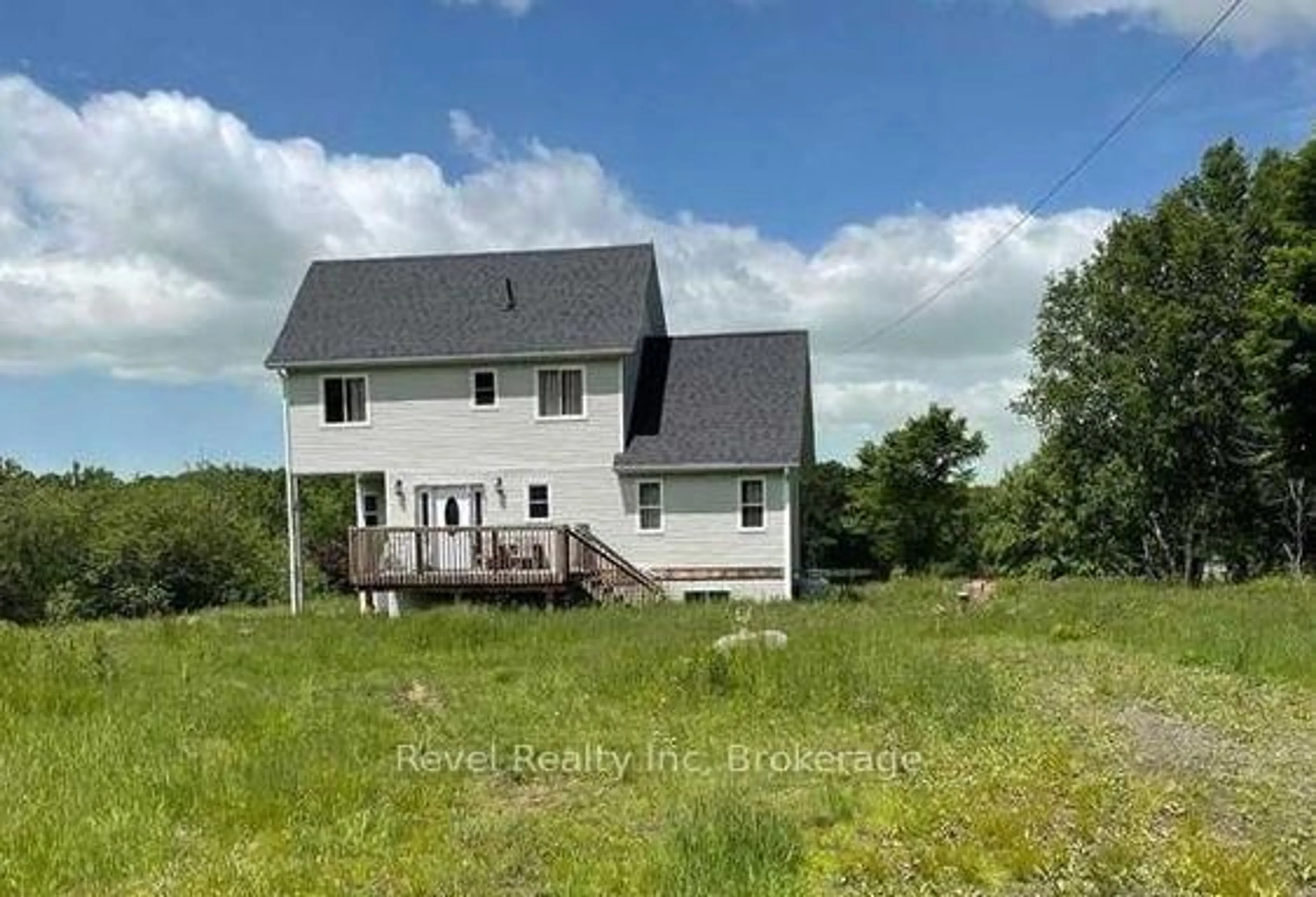 A pic from outside/outdoor area/front of a property/back of a property/a pic from drone, building for 64 Jones Rd, McKellar Ontario P2A 2W7