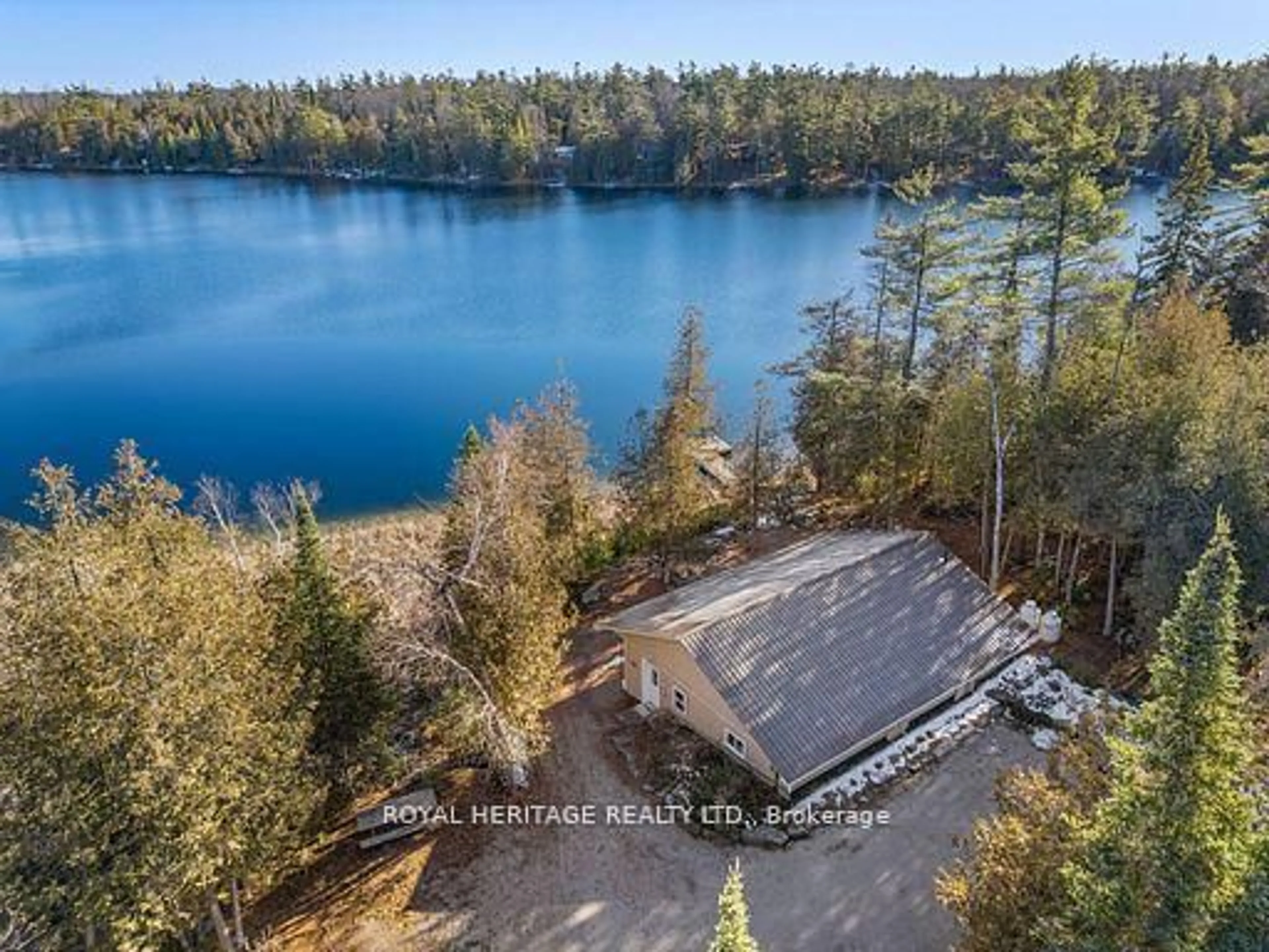 A pic from outside/outdoor area/front of a property/back of a property/a pic from drone, water/lake/river/ocean view for 1330 County Rd 49 Rd, Kawartha Lakes Ontario K0M 1A0