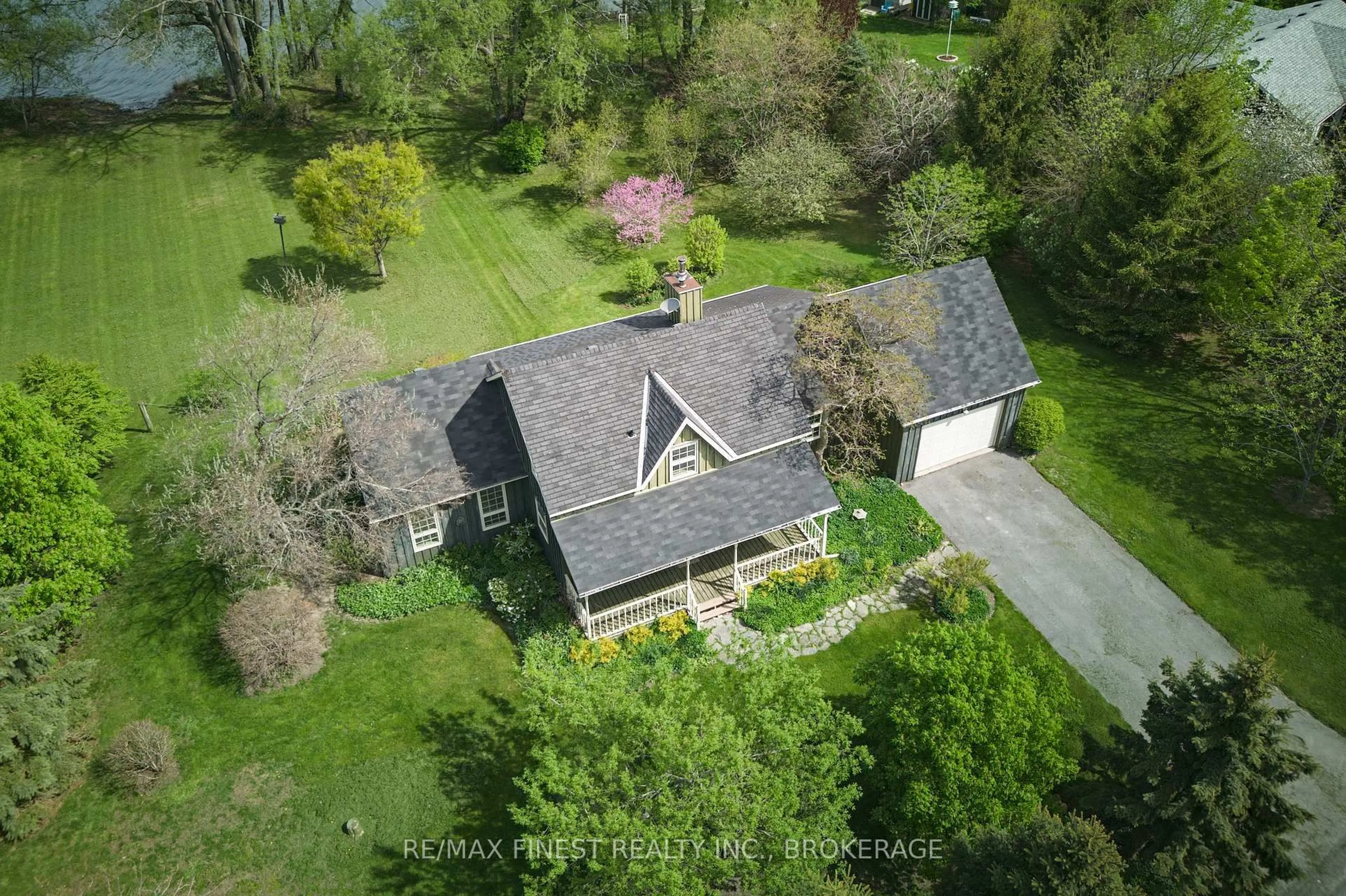 A pic from outside/outdoor area/front of a property/back of a property/a pic from drone, street for 9910 Front Rd, Stella Ontario K0H 2S0