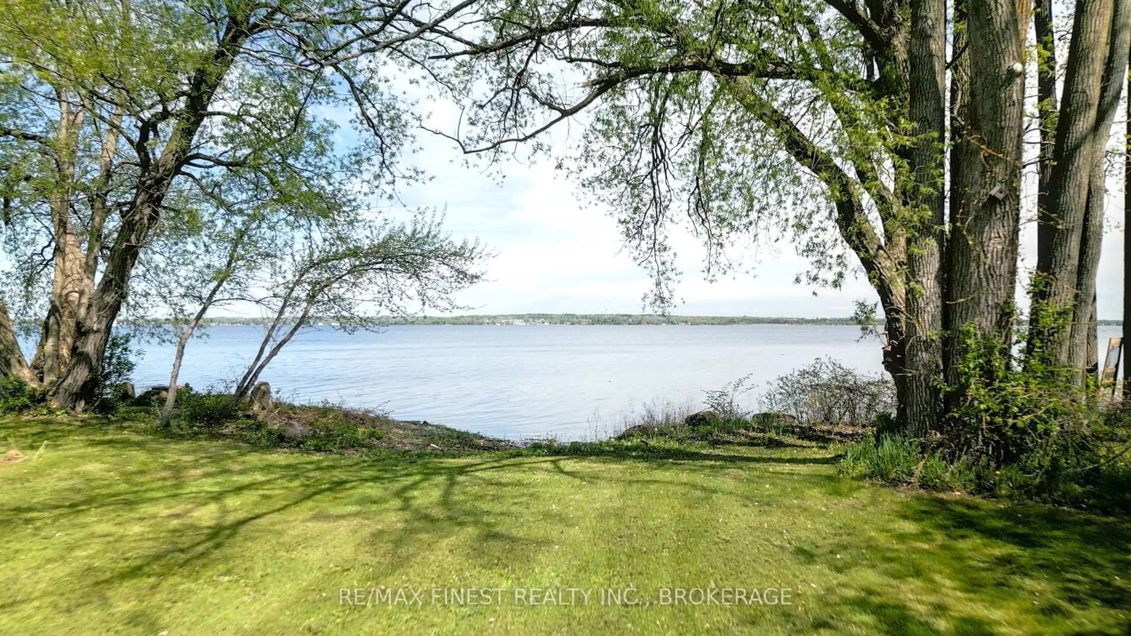 A pic from outside/outdoor area/front of a property/back of a property/a pic from drone, water/lake/river/ocean view for 9910 Front Rd, Stella Ontario K0H 2S0