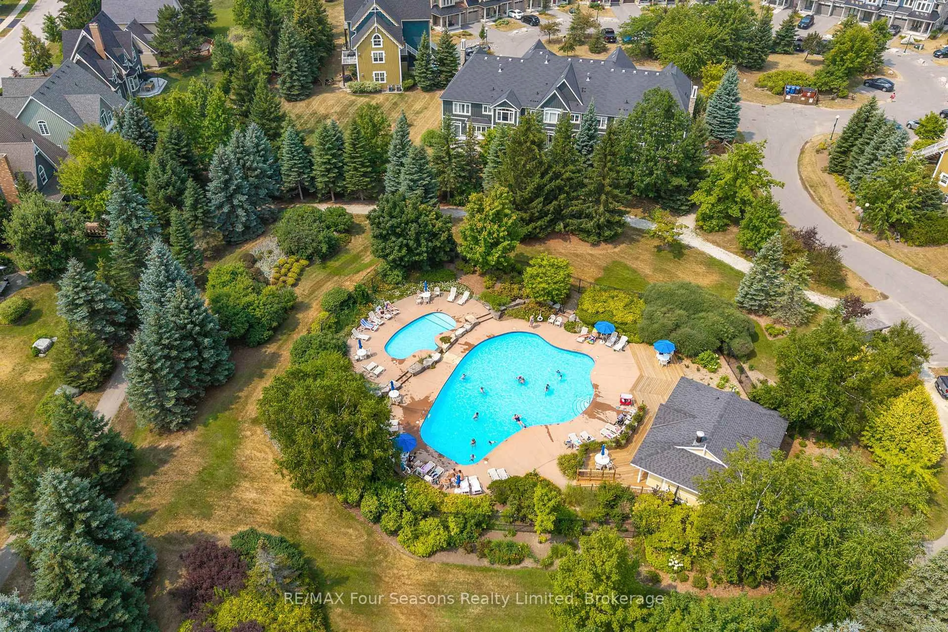 A pic from outside/outdoor area/front of a property/back of a property/a pic from drone, water/lake/river/ocean view for 184 Snowbridge Way #114, Blue Mountains Ontario L9Y 0V1