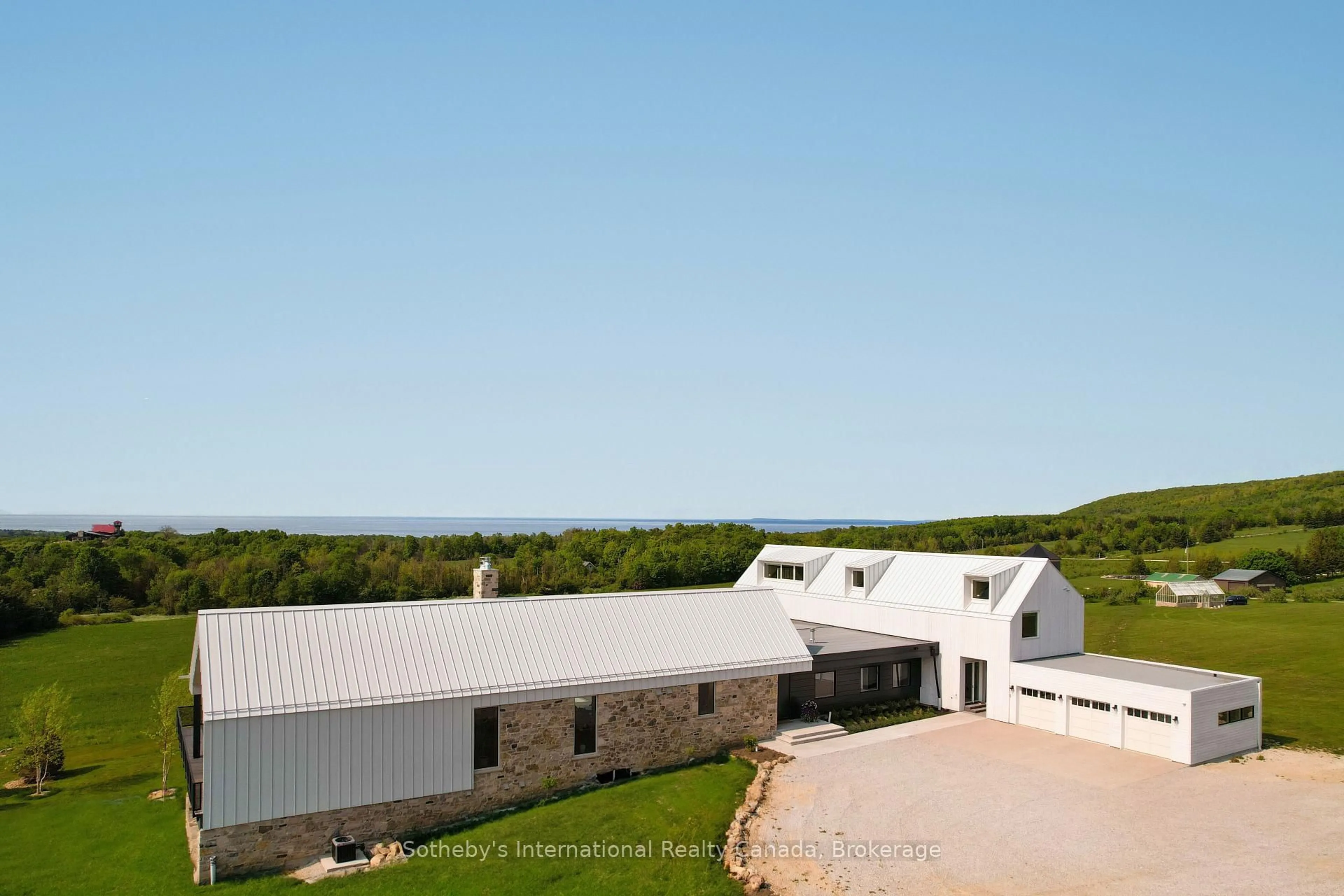 A pic from outside/outdoor area/front of a property/back of a property/a pic from drone, building for 516450 7th Line, Blue Mountains Ontario N0H 1J0