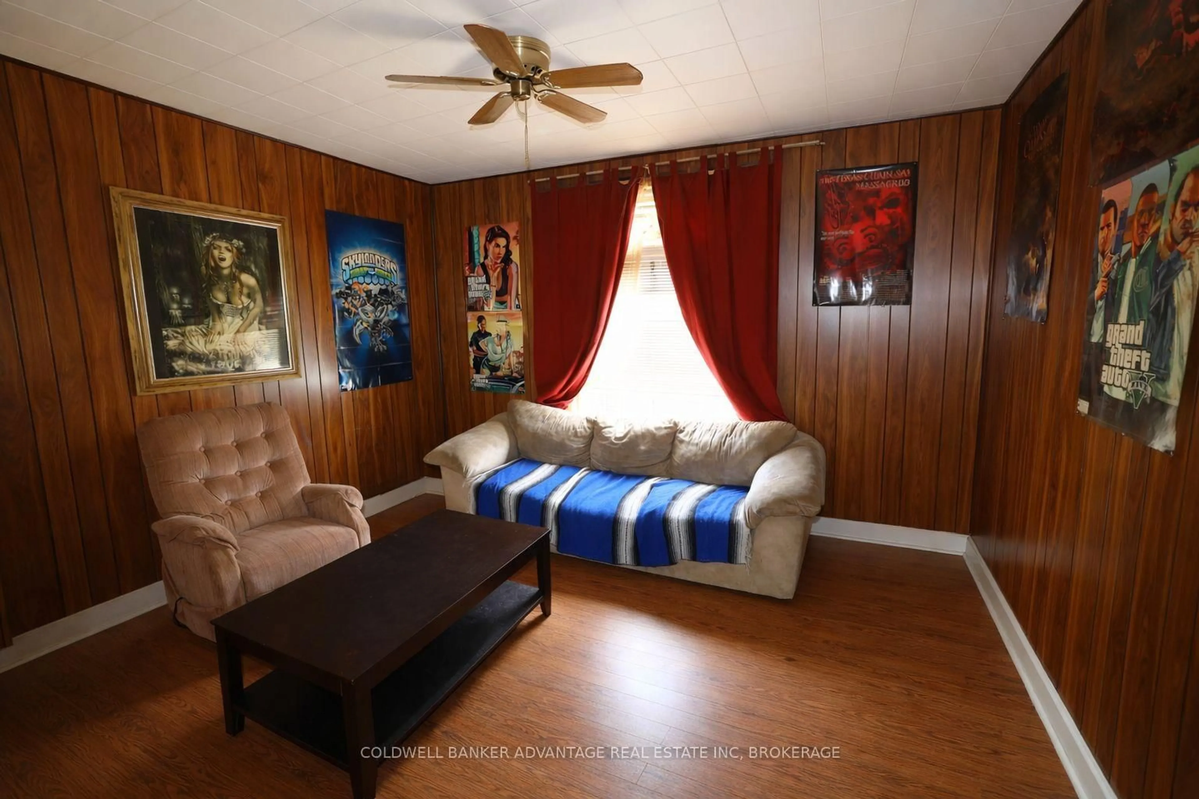 Living room with furniture, wood/laminate floor for 748 King St, Port Colborne Ontario L3K 4J2