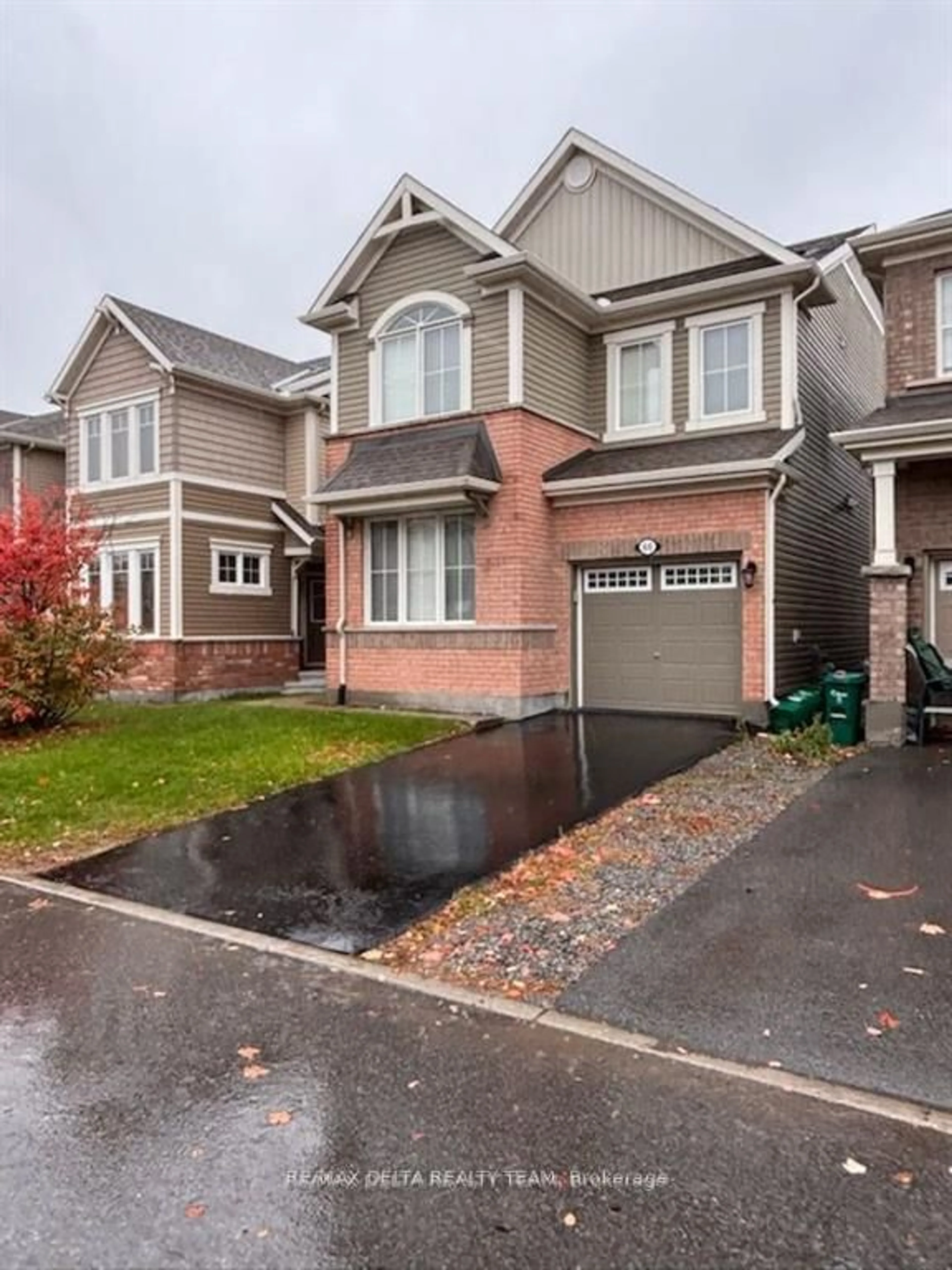 Home with brick exterior material, street for 66 Escallonia Crt, Ottawa Ontario K2S 0W9