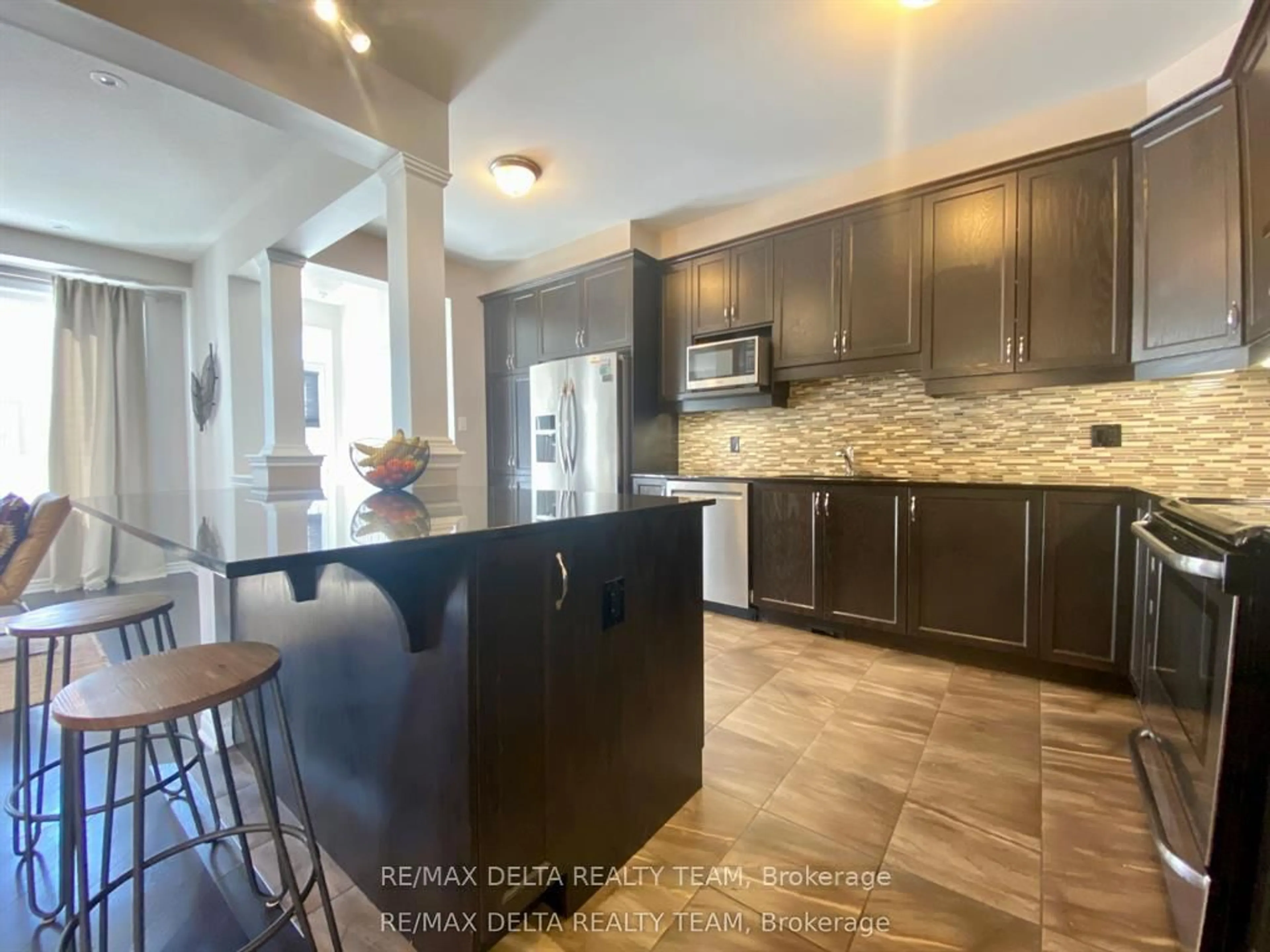 Open concept kitchen, ceramic/tile floor for 66 Escallonia Crt, Ottawa Ontario K2S 0W9