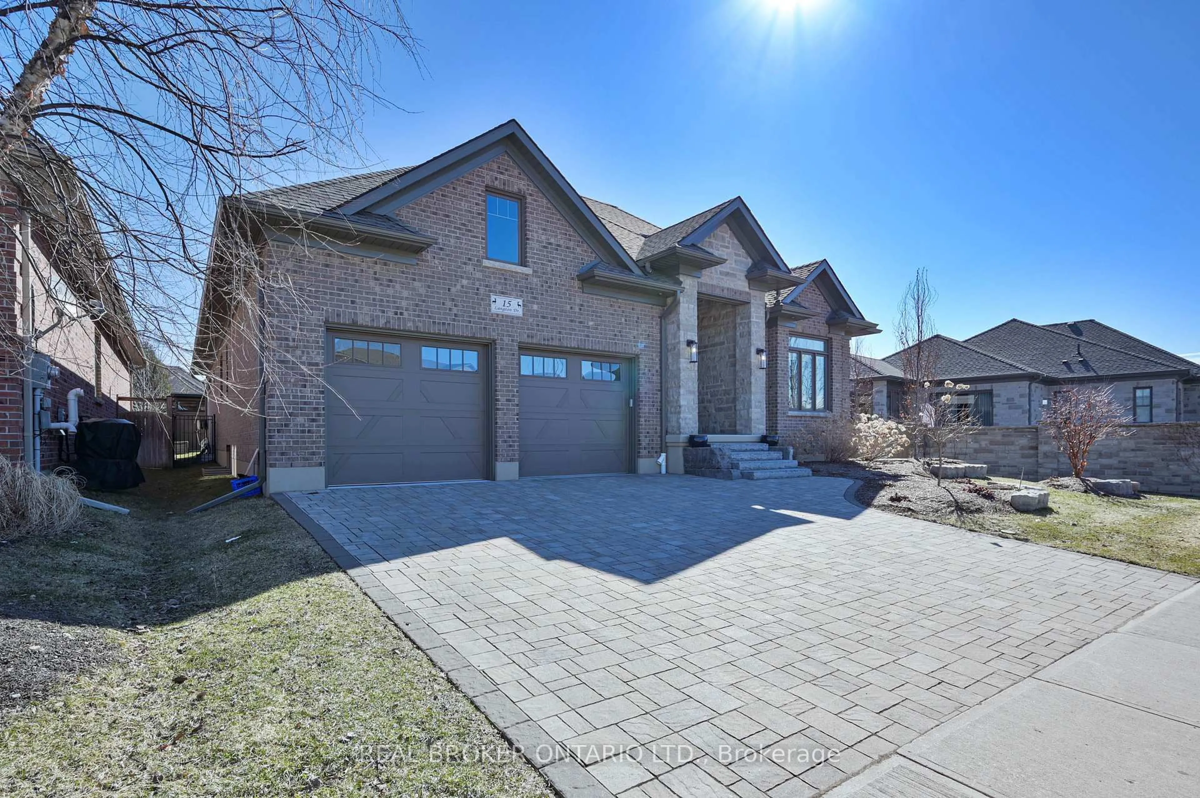 Home with brick exterior material, street for 15 LANGTON Dr, Kitchener Ontario N2P 2X9