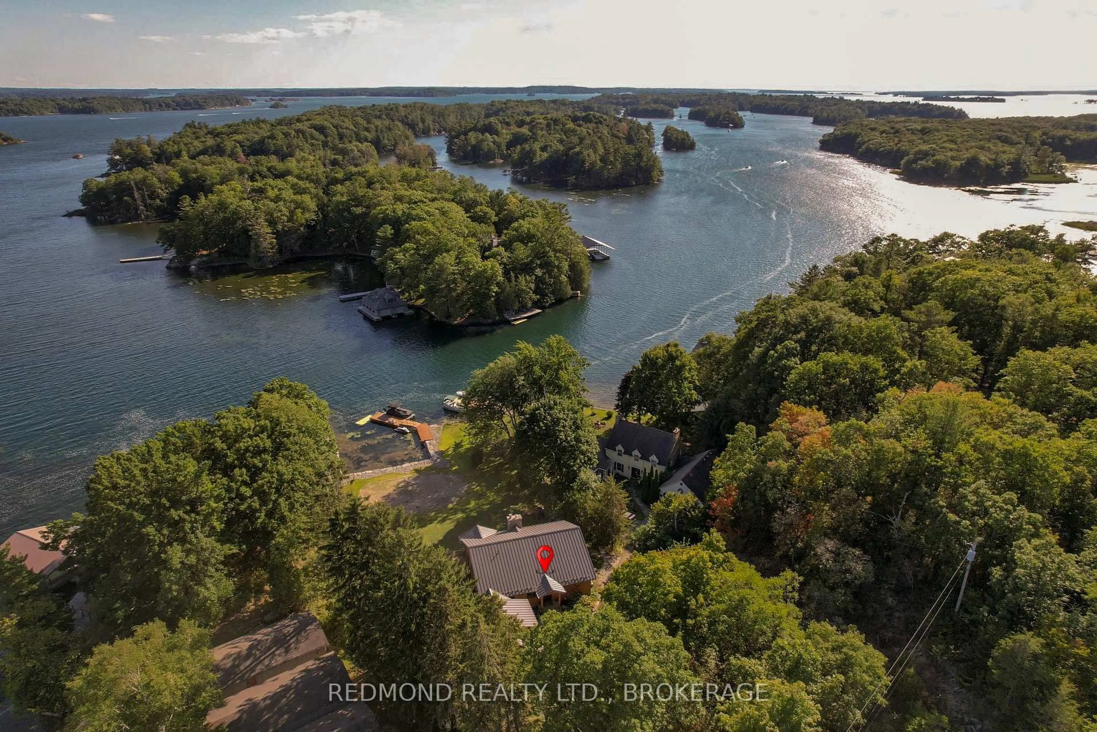 A pic from outside/outdoor area/front of a property/back of a property/a pic from drone, water/lake/river/ocean view for 403 Thousand Islands Pkwy, Lansdowne Ontario K0E 1L0