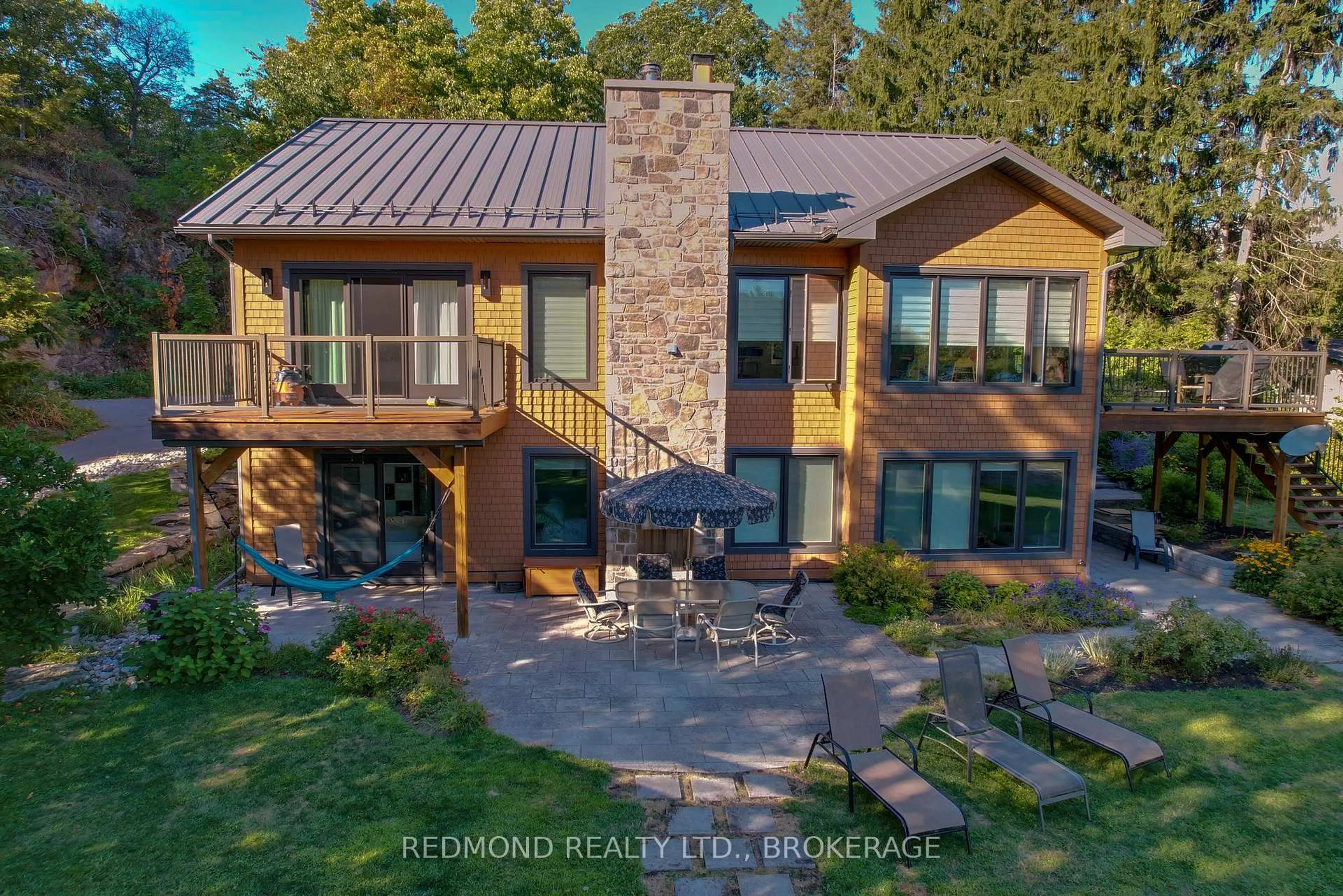 Home with brick exterior material, mountain view for 403 Thousand Islands Pkwy, Lansdowne Ontario K0E 1L0