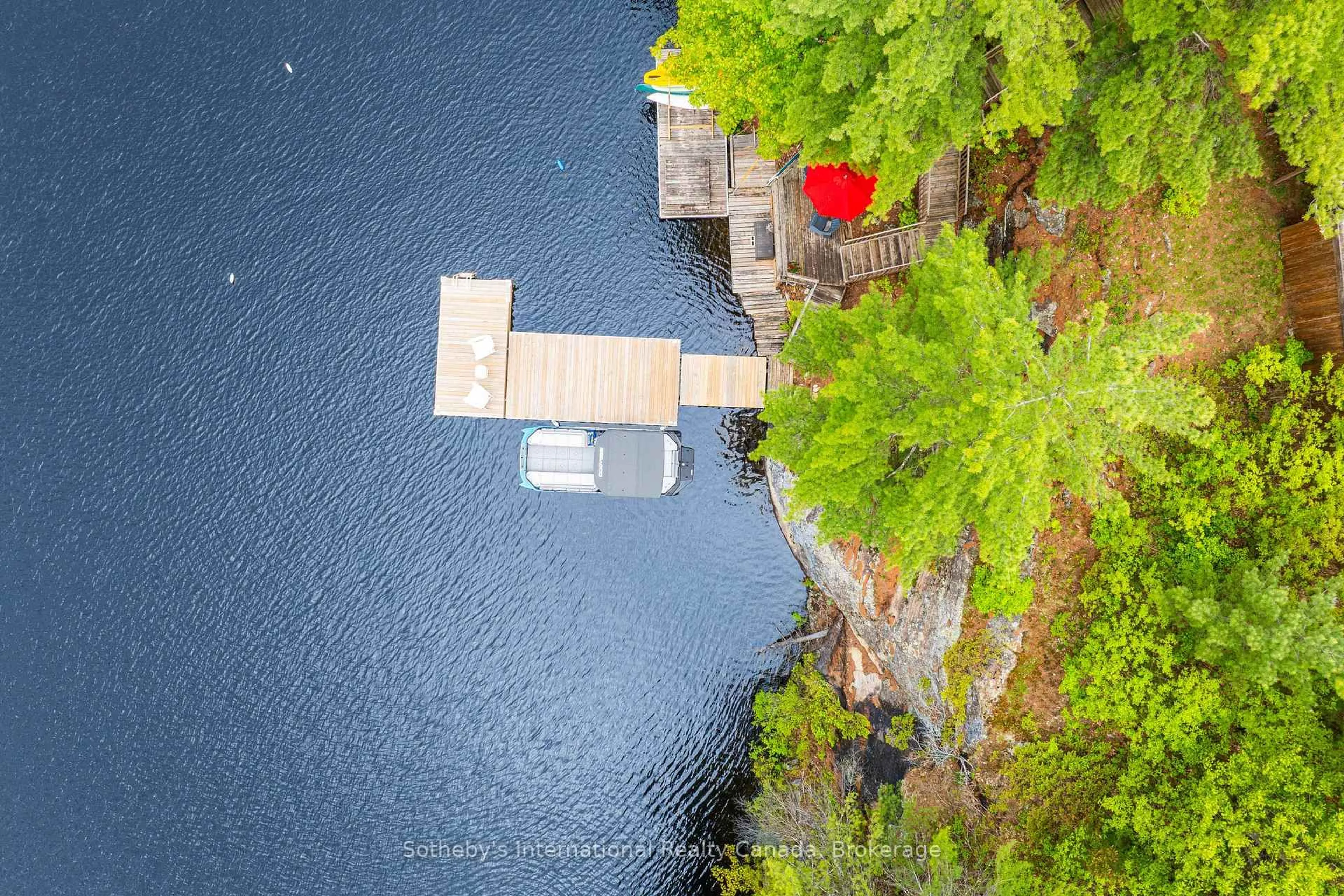 A pic from outside/outdoor area/front of a property/back of a property/a pic from drone, water/lake/river/ocean view for 5760 Kahshe Lake, Gravenhurst Ontario P0E 1G0