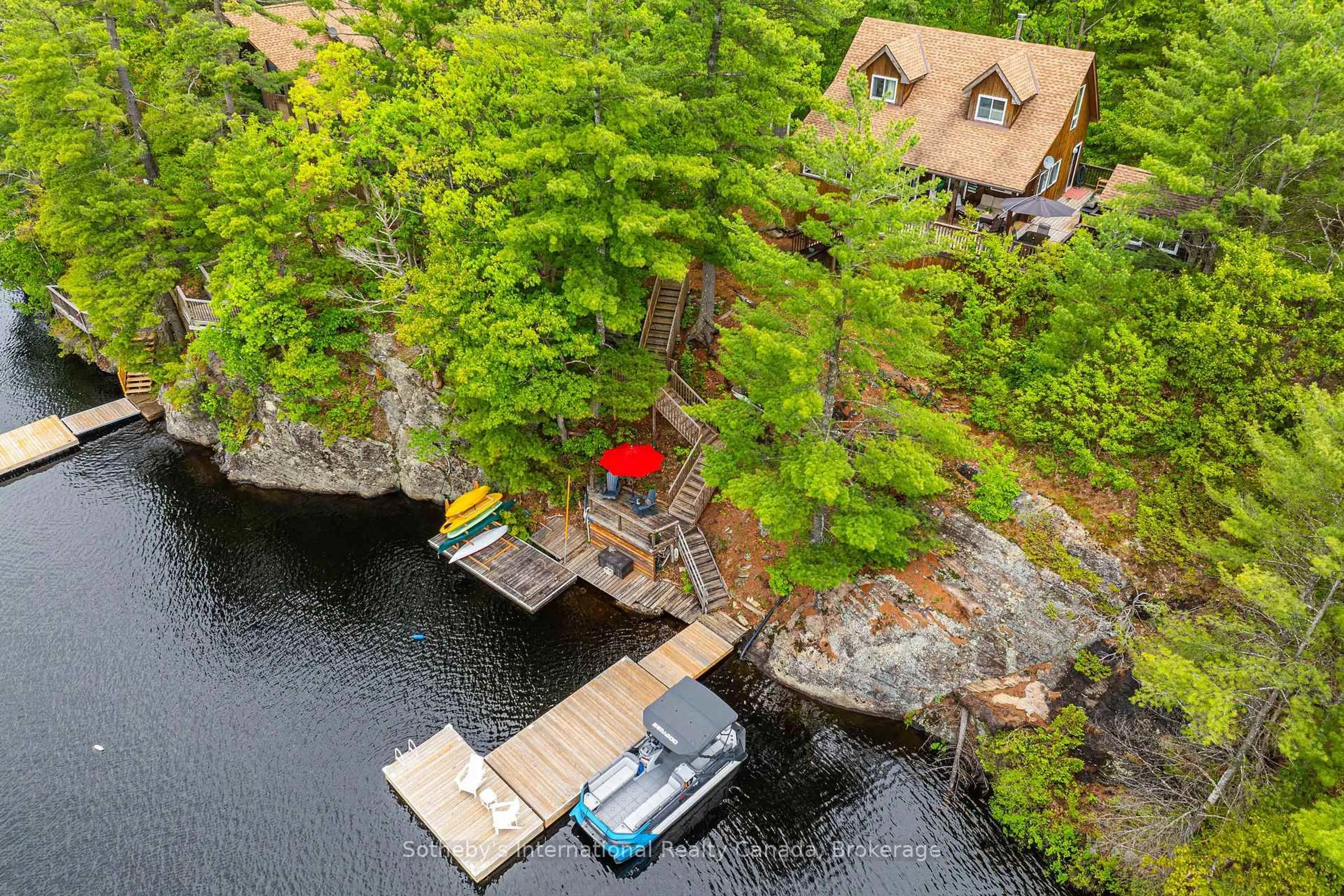 A pic from outside/outdoor area/front of a property/back of a property/a pic from drone, water/lake/river/ocean view for 5760 Kahshe Lake, Gravenhurst Ontario P0E 1G0