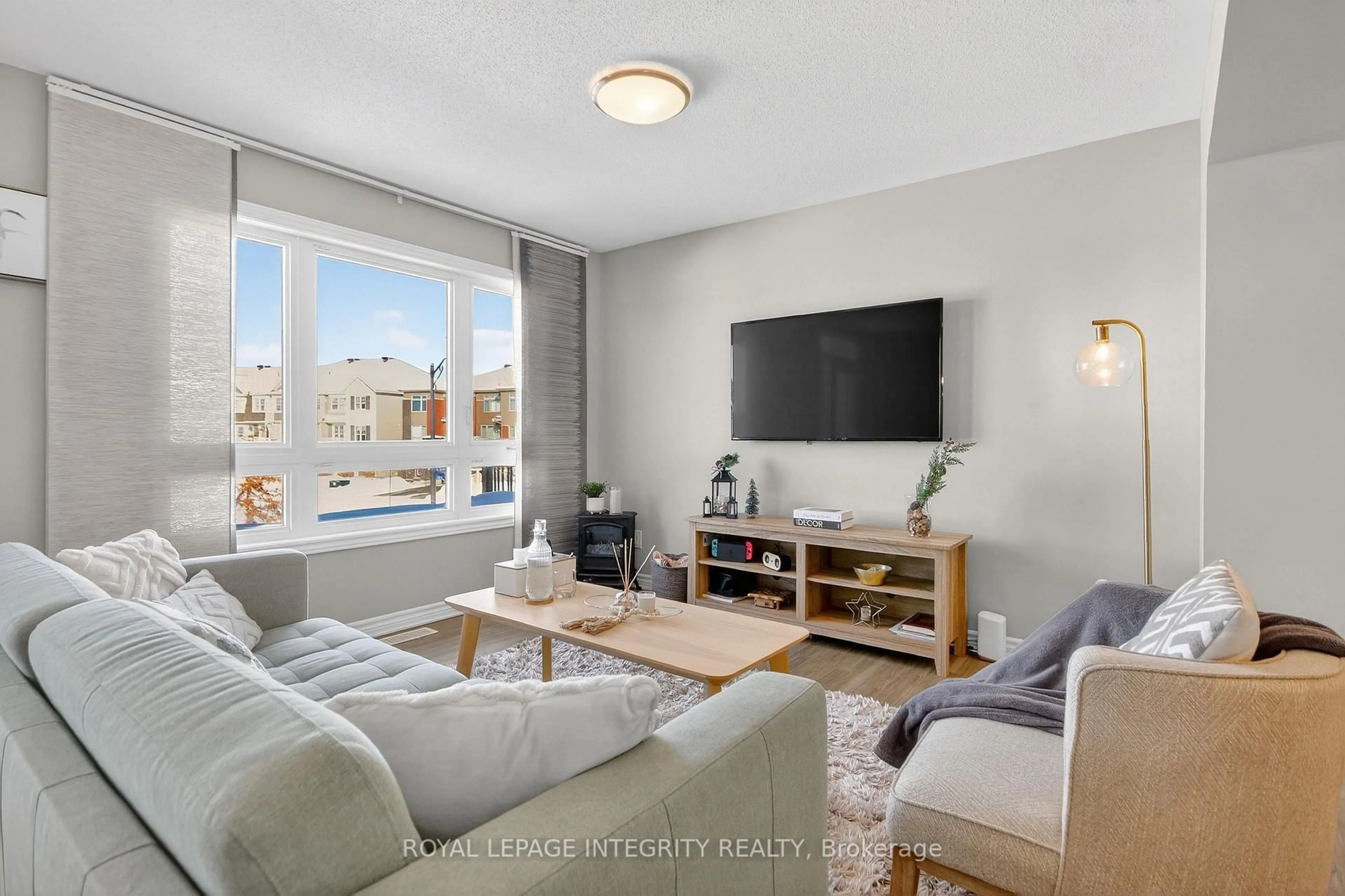 Living room with furniture, unknown for 64 Feathertop Lane, Ottawa Ontario K2V 0K7