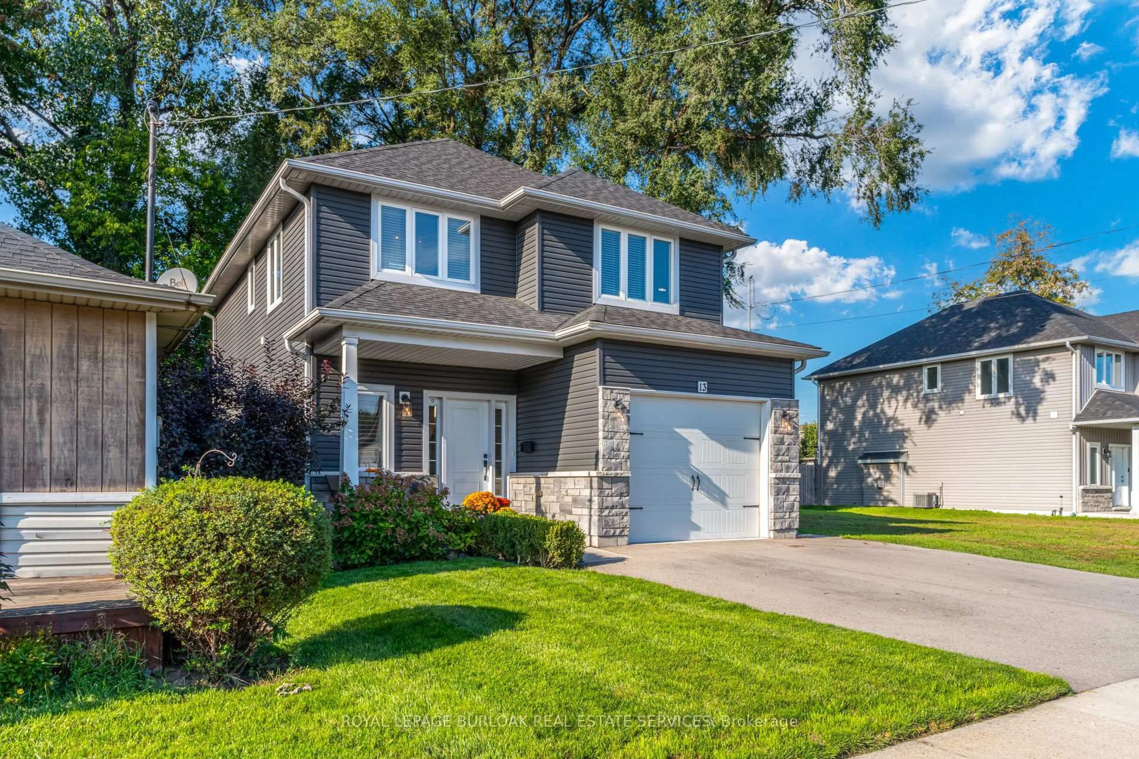 Home with vinyl exterior material, street for 13 Clare Ave, Hamilton Ontario L8H 7C9