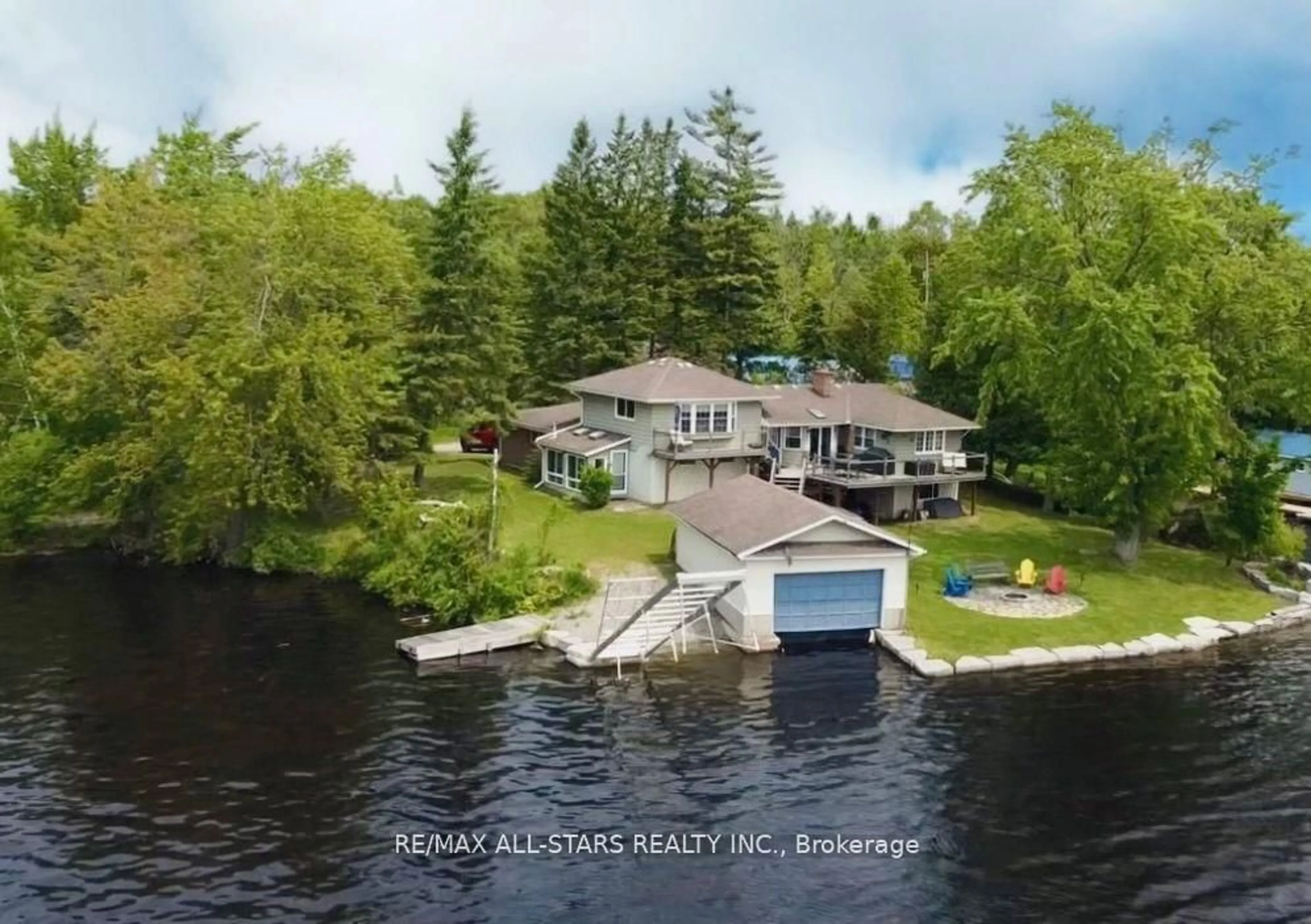 A pic from outside/outdoor area/front of a property/back of a property/a pic from drone, water/lake/river/ocean view for 11 Fire Route 94A Rte, Trent Lakes Ontario K0M 1A0