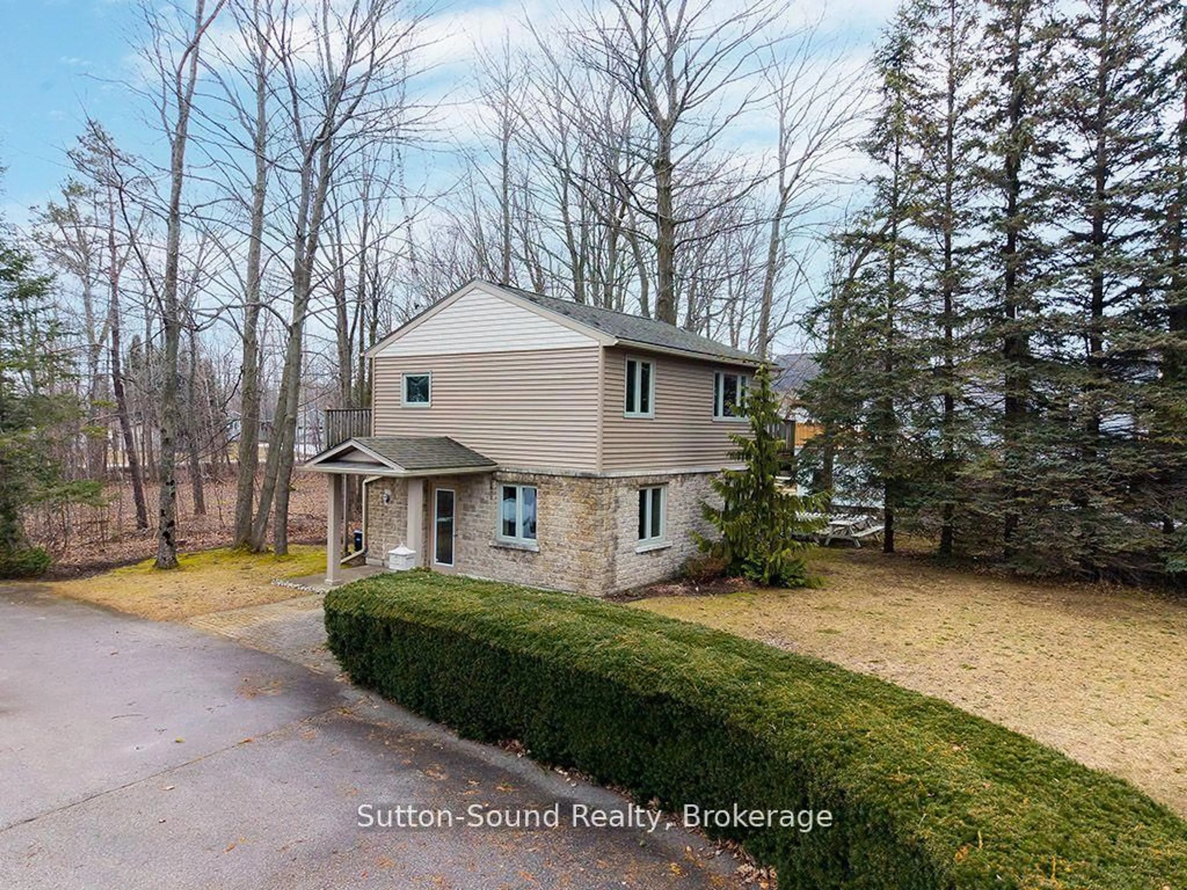 A pic from outside/outdoor area/front of a property/back of a property/a pic from drone, street for 660 Main St, South Bruce Peninsula Ontario N0H 2T0