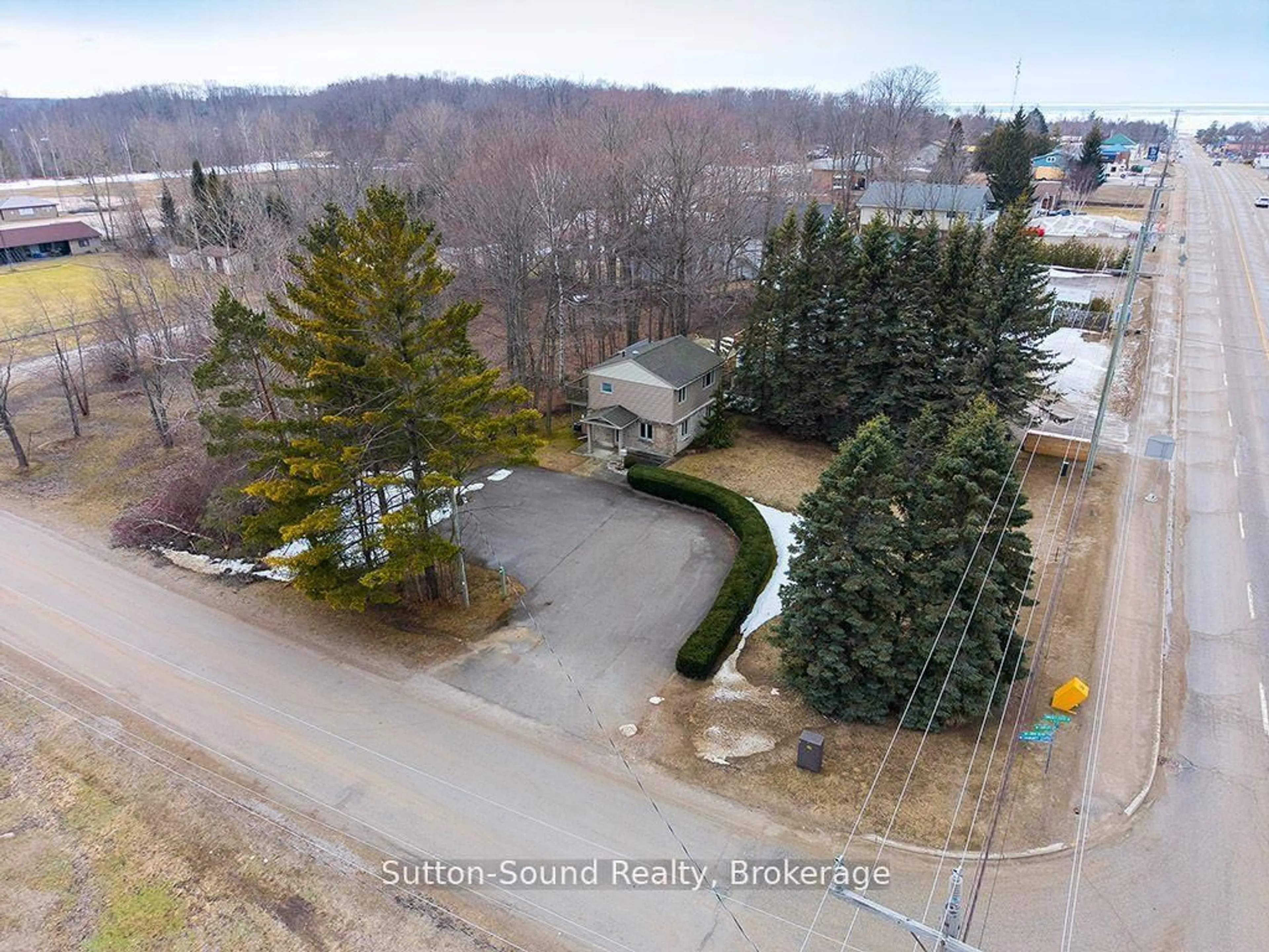 A pic from outside/outdoor area/front of a property/back of a property/a pic from drone, unknown for 660 Main St, South Bruce Peninsula Ontario N0H 2T0
