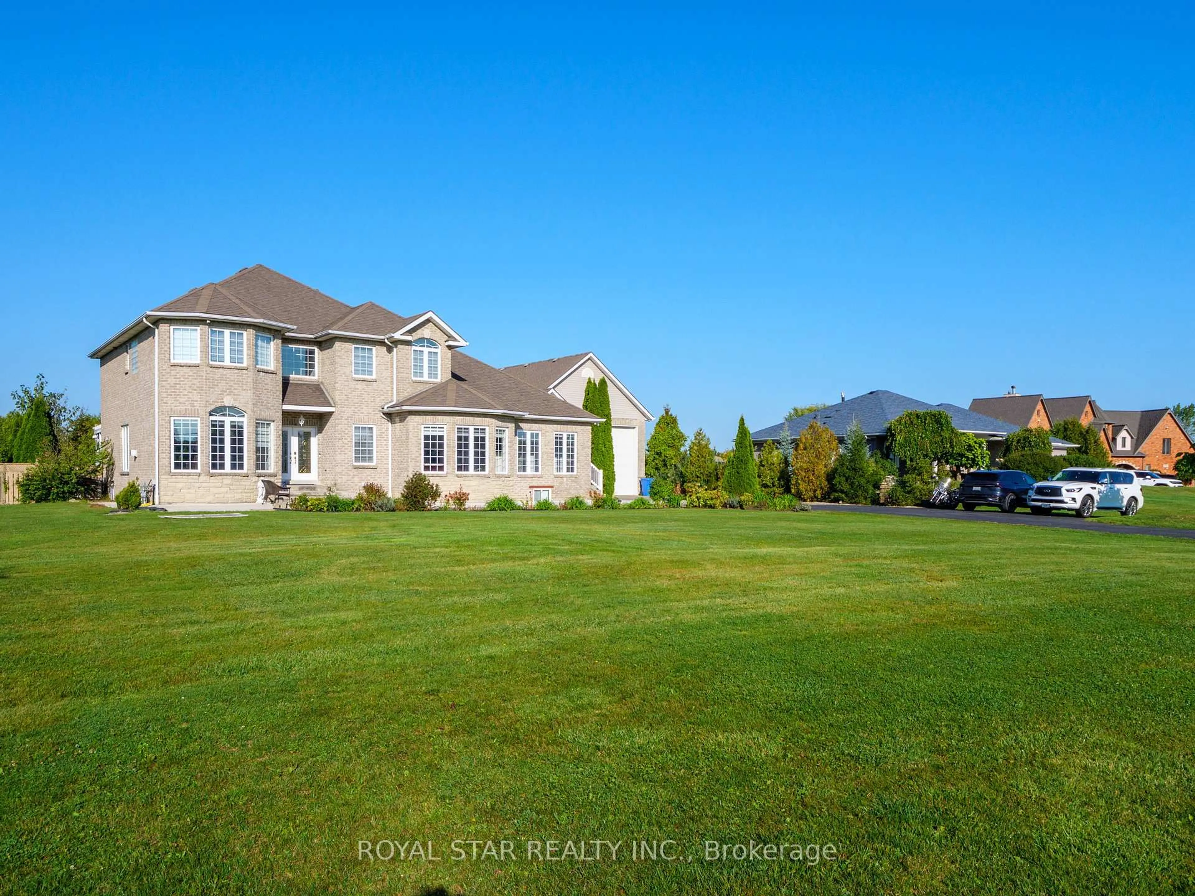 A pic from outside/outdoor area/front of a property/back of a property/a pic from drone, mountain view for 1951 County Road 27, Lakeshore Ontario N0R 1V0
