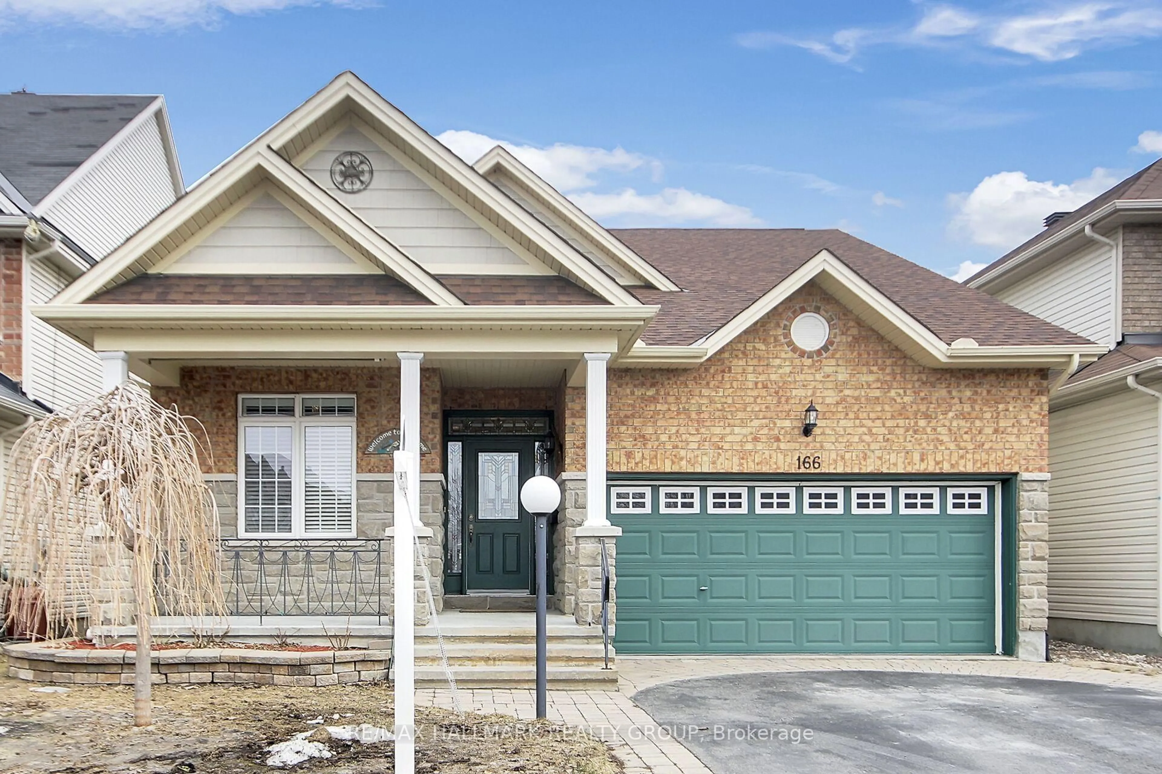 Home with brick exterior material, street for 166 Lamplighters Dr, Ottawa Ontario K2J 0H6