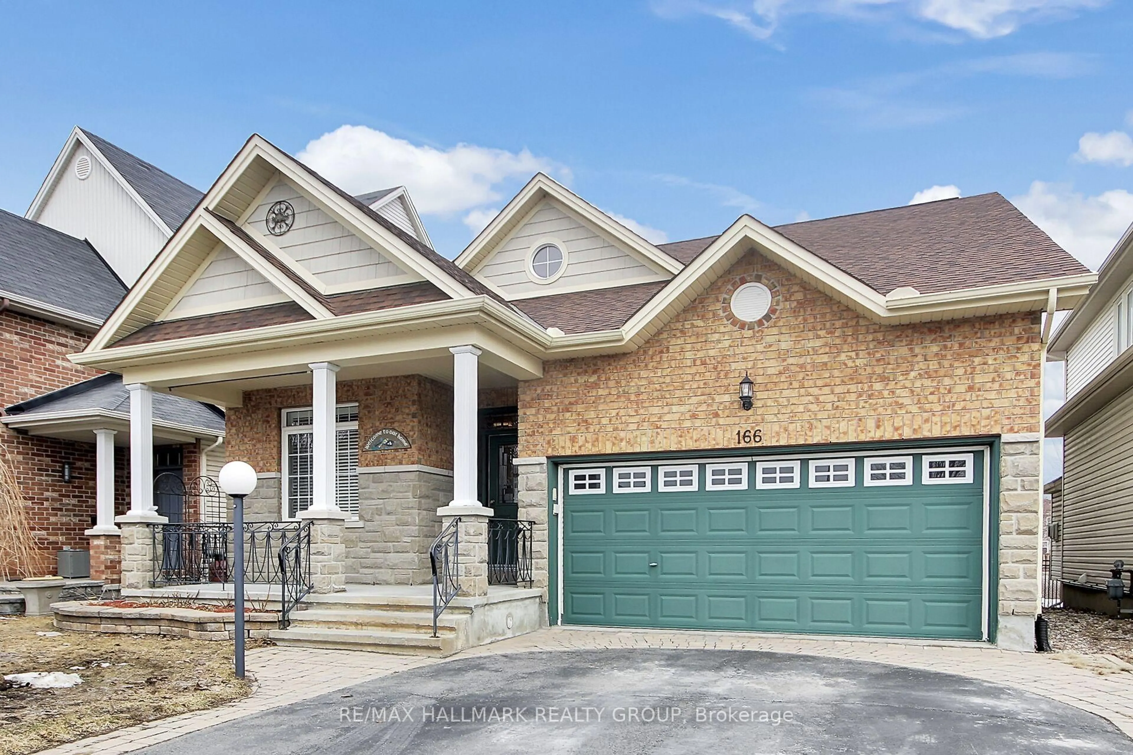 Home with brick exterior material, street for 166 Lamplighters Dr, Ottawa Ontario K2J 0H6
