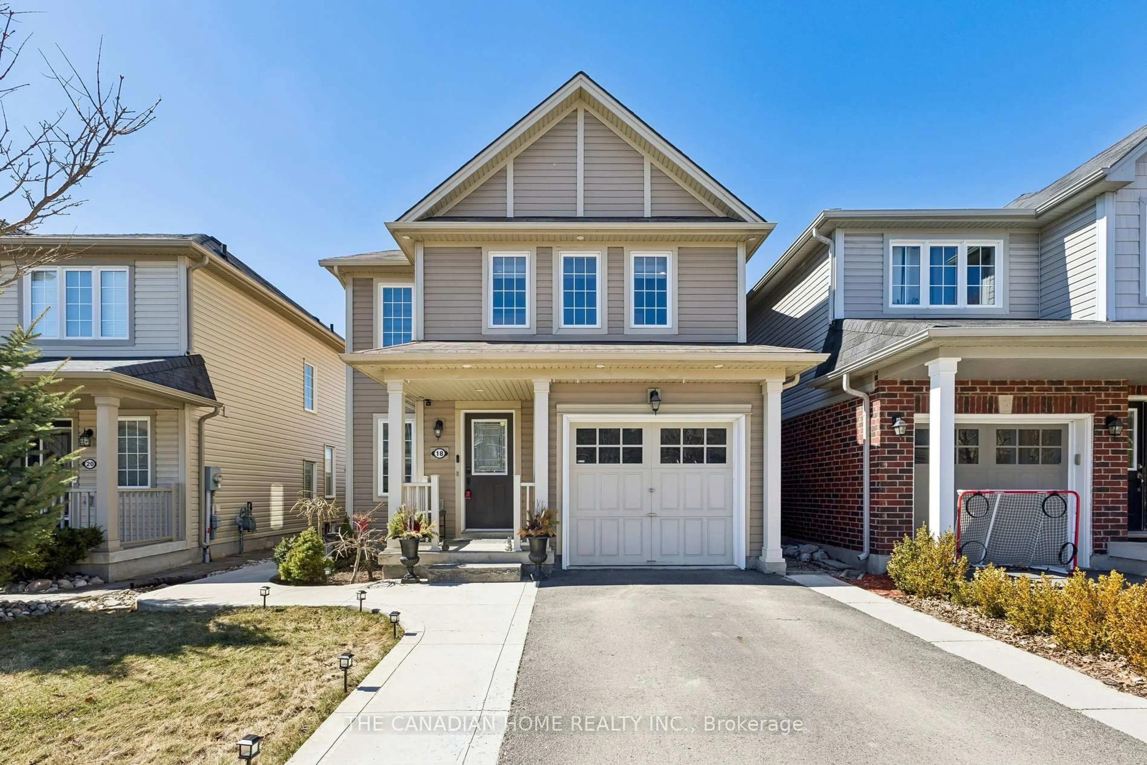 Home with brick exterior material, street for 18 Merritt Lane, Brantford Ontario N3T 0E8