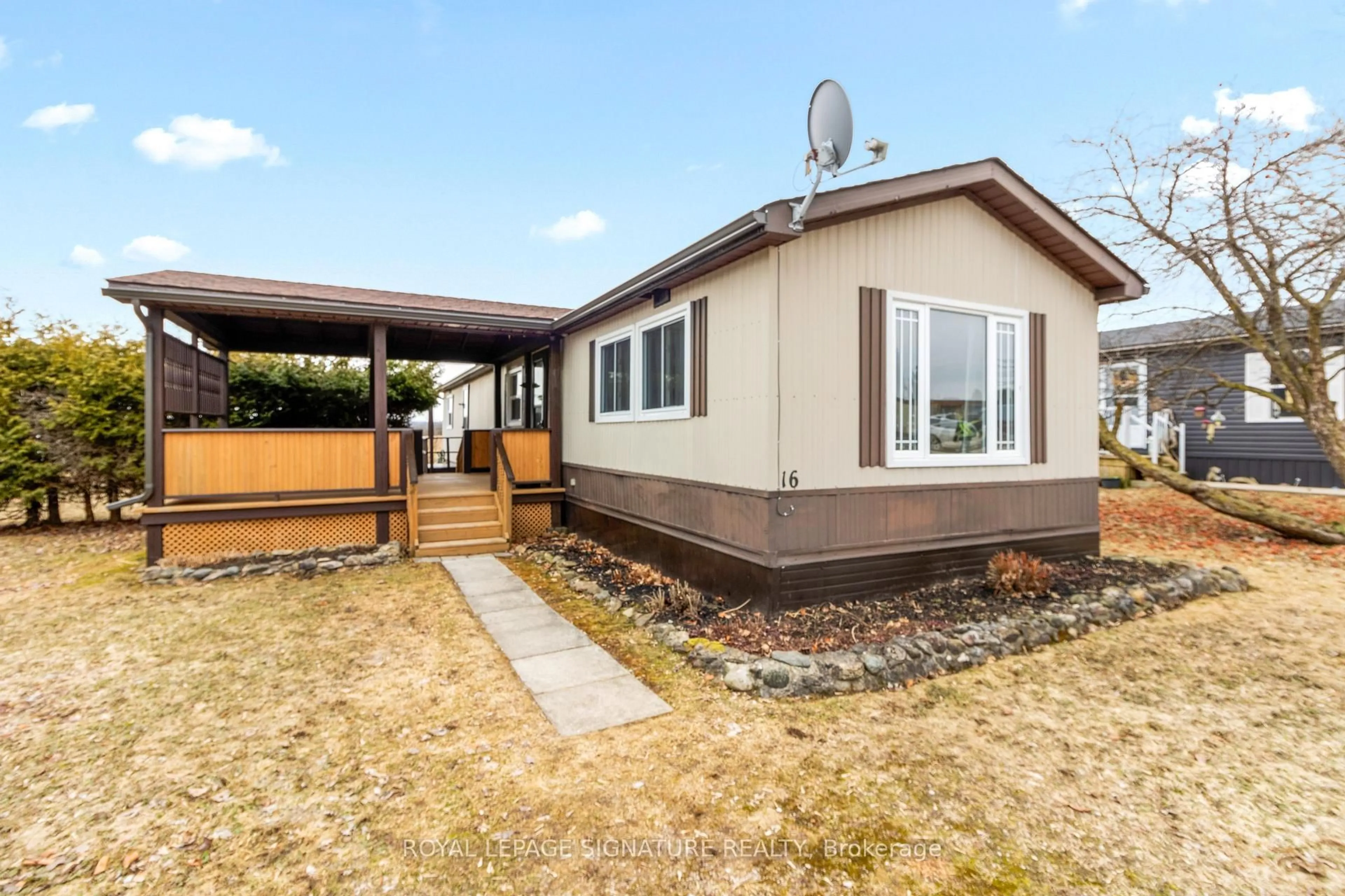 Home with vinyl exterior material, street for 302694 Douglas St #16, West Grey Ontario N0G 1R0