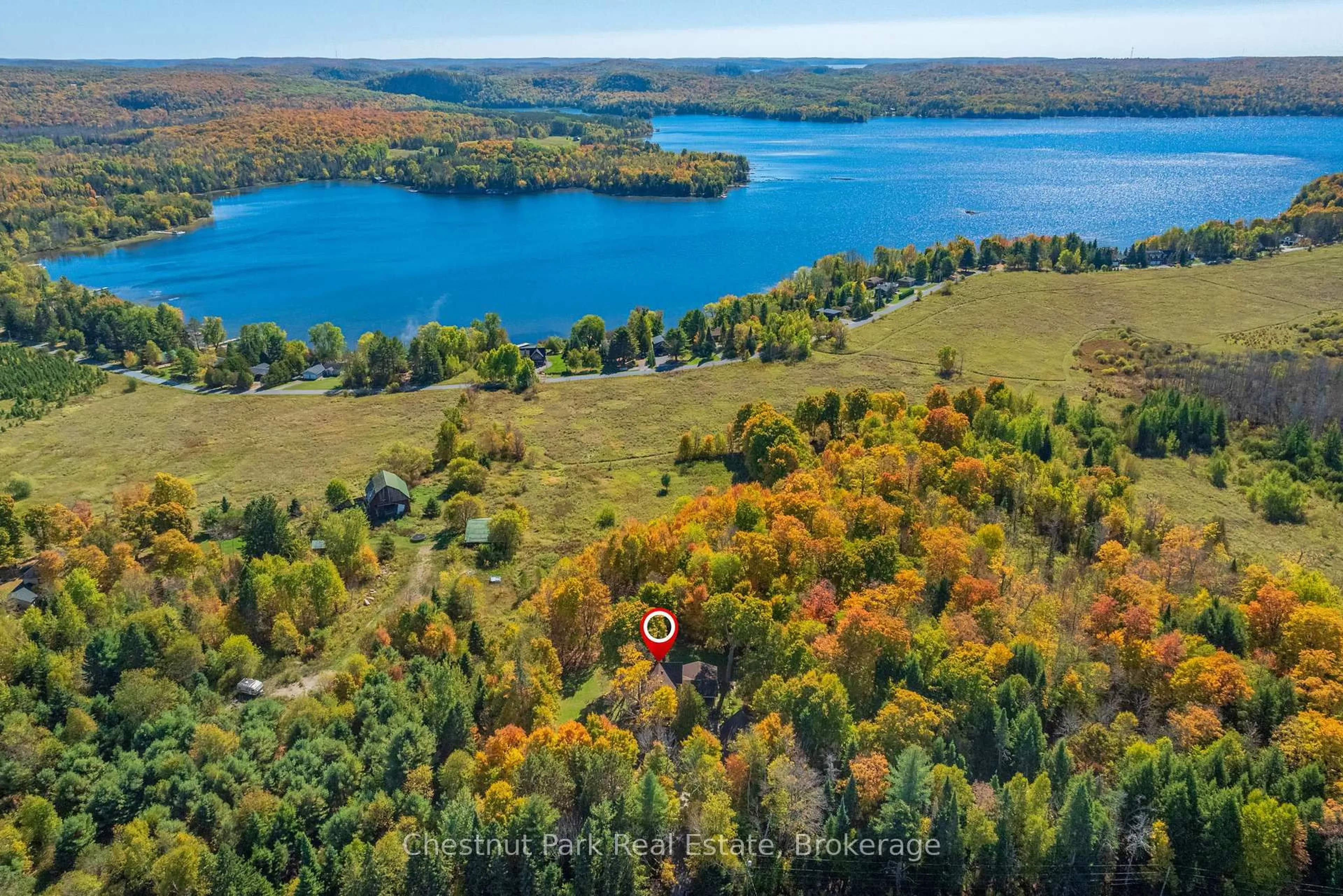 A pic from outside/outdoor area/front of a property/back of a property/a pic from drone, water/lake/river/ocean view for 2360 60 Highway, Lake of Bays Ontario P1H 2J6