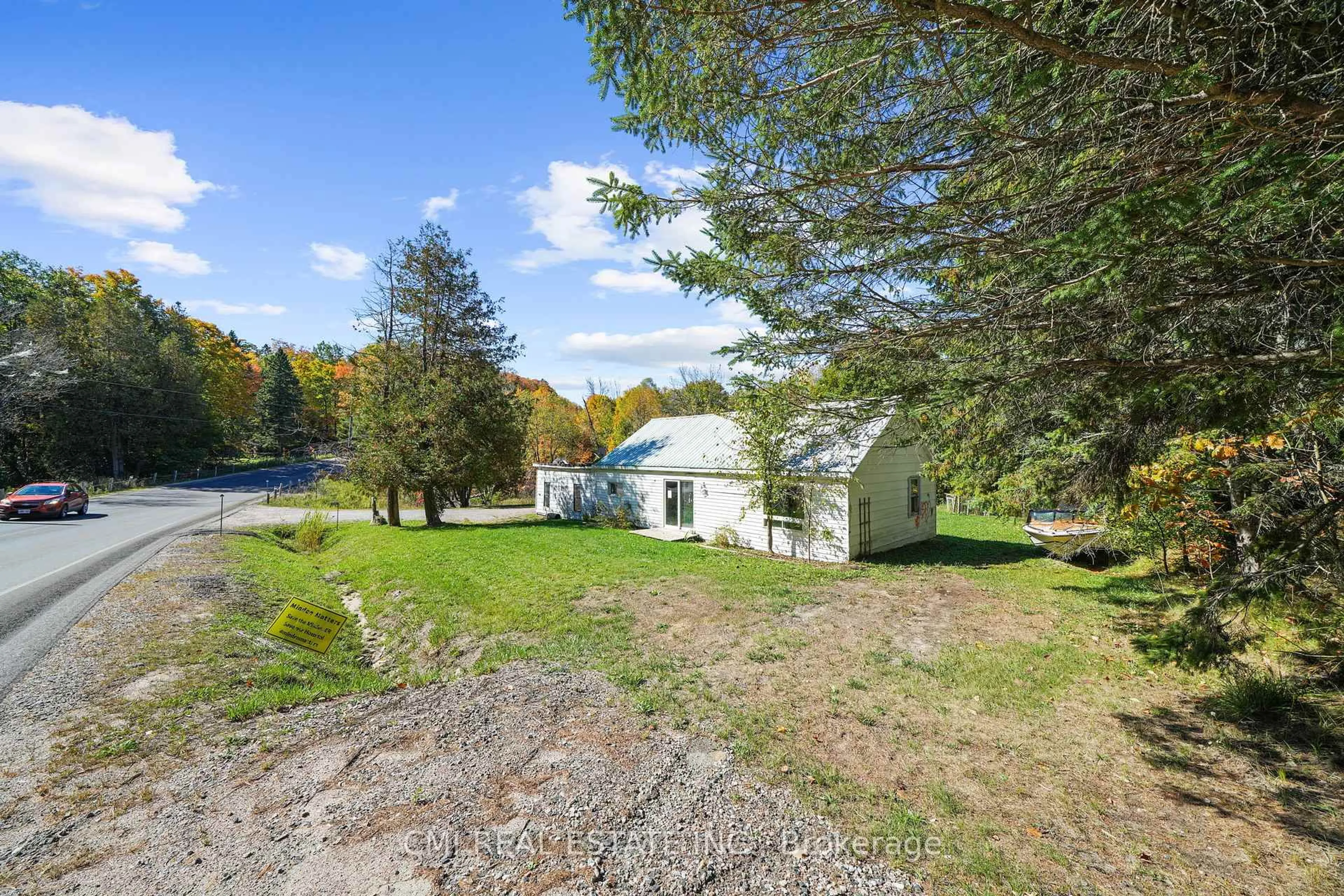 A pic from outside/outdoor area/front of a property/back of a property/a pic from drone, unknown for 1093 South Lake Rd, Minden Hills Ontario K0M 2K0