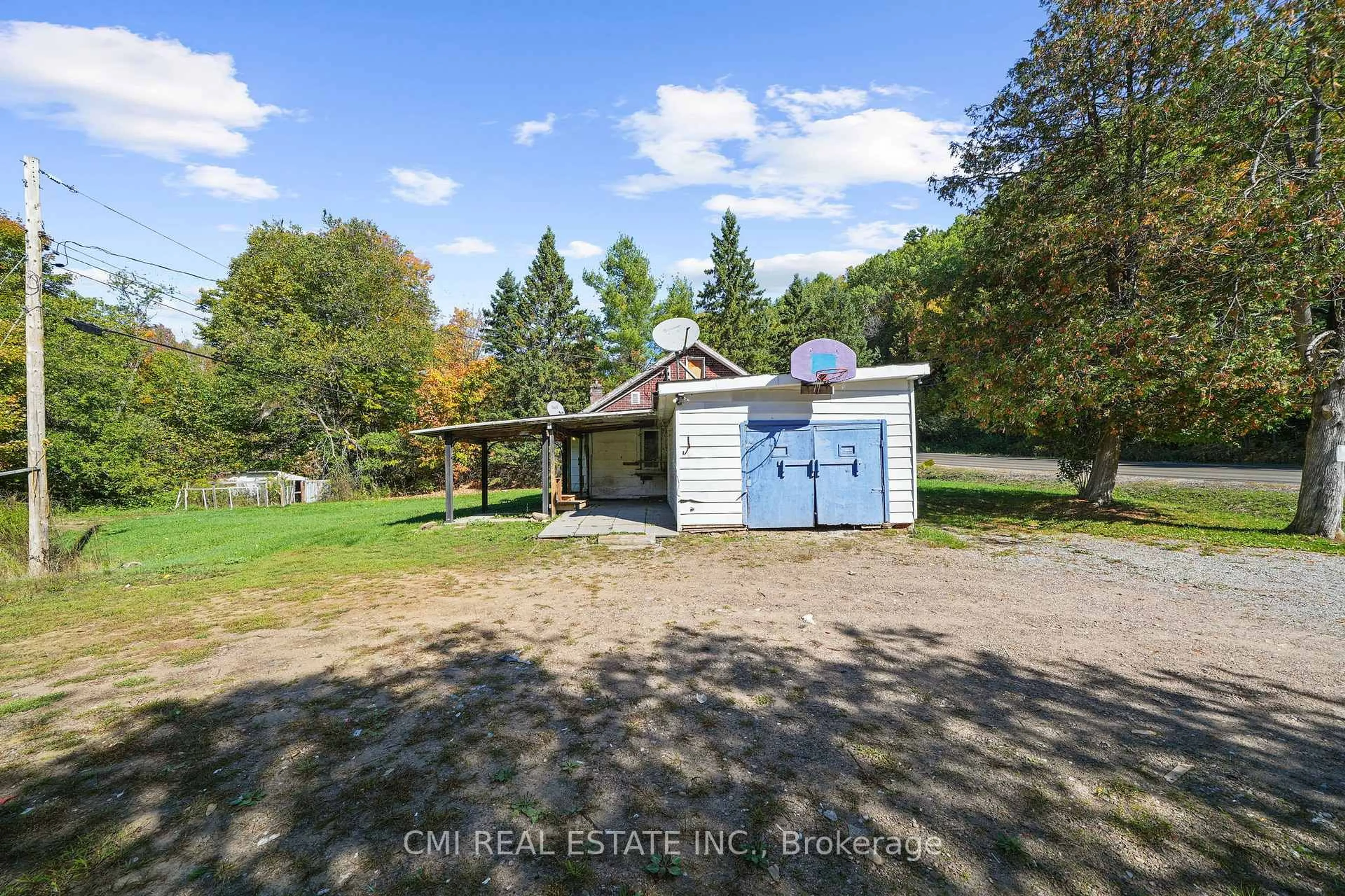 A pic from outside/outdoor area/front of a property/back of a property/a pic from drone, water/lake/river/ocean view for 1093 South Lake Rd, Minden Hills Ontario K0M 2K0