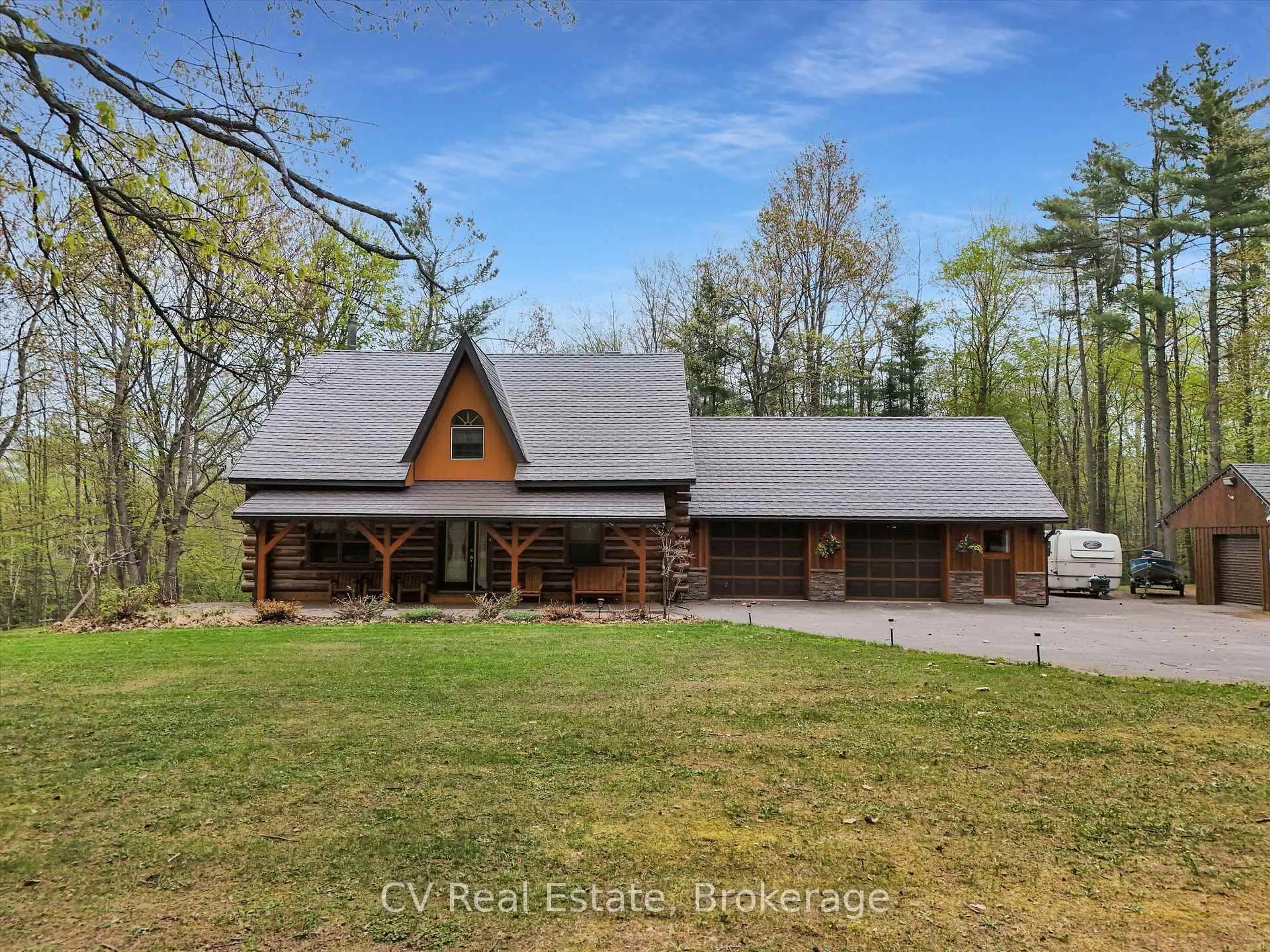 A pic from outside/outdoor area/front of a property/back of a property/a pic from drone, water/lake/river/ocean view for 1040 Amelia Cres, Gravenhurst Ontario P0E 1G0