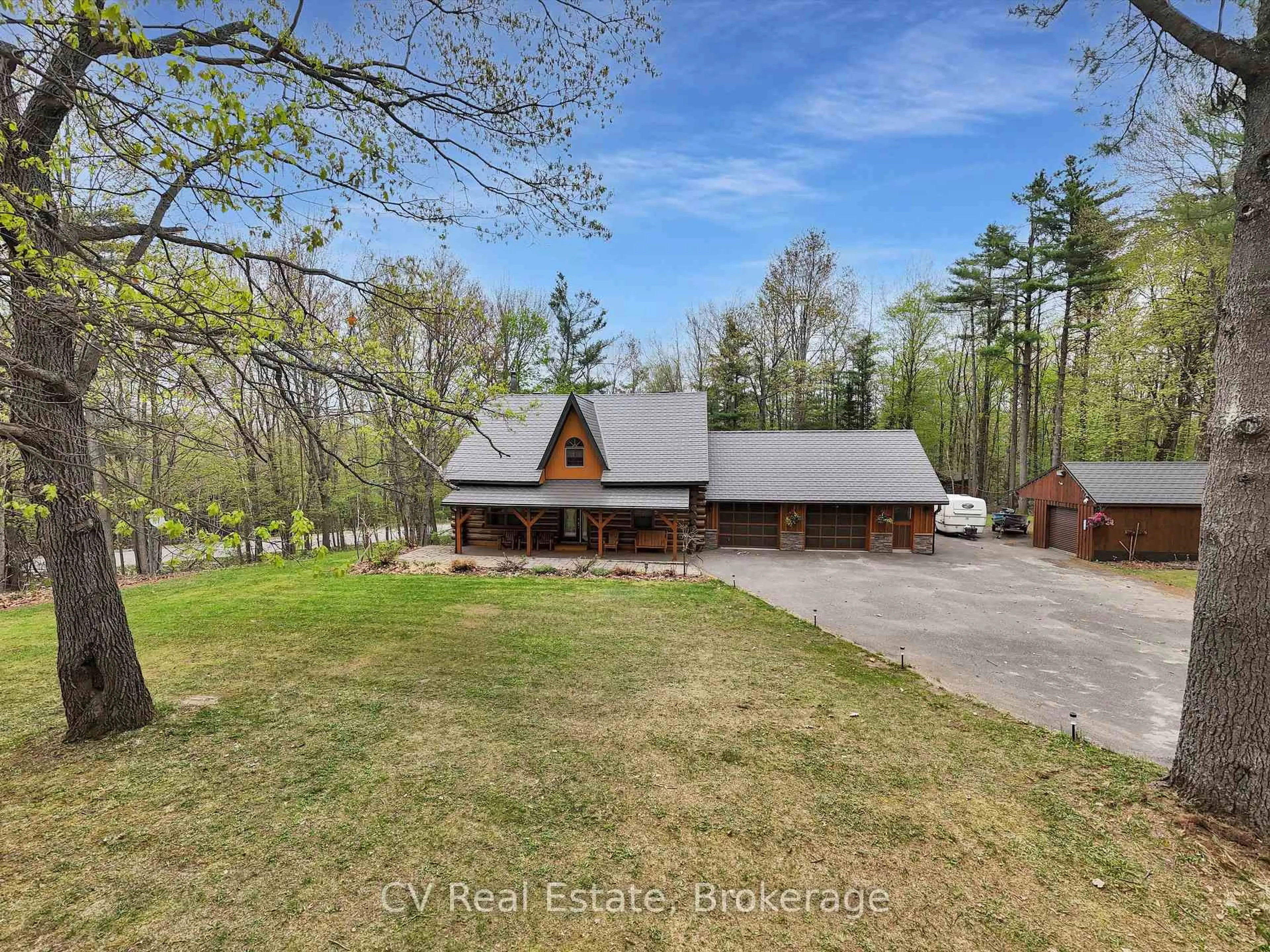 A pic from outside/outdoor area/front of a property/back of a property/a pic from drone, water/lake/river/ocean view for 1040 Amelia Cres, Gravenhurst Ontario P0E 1G0